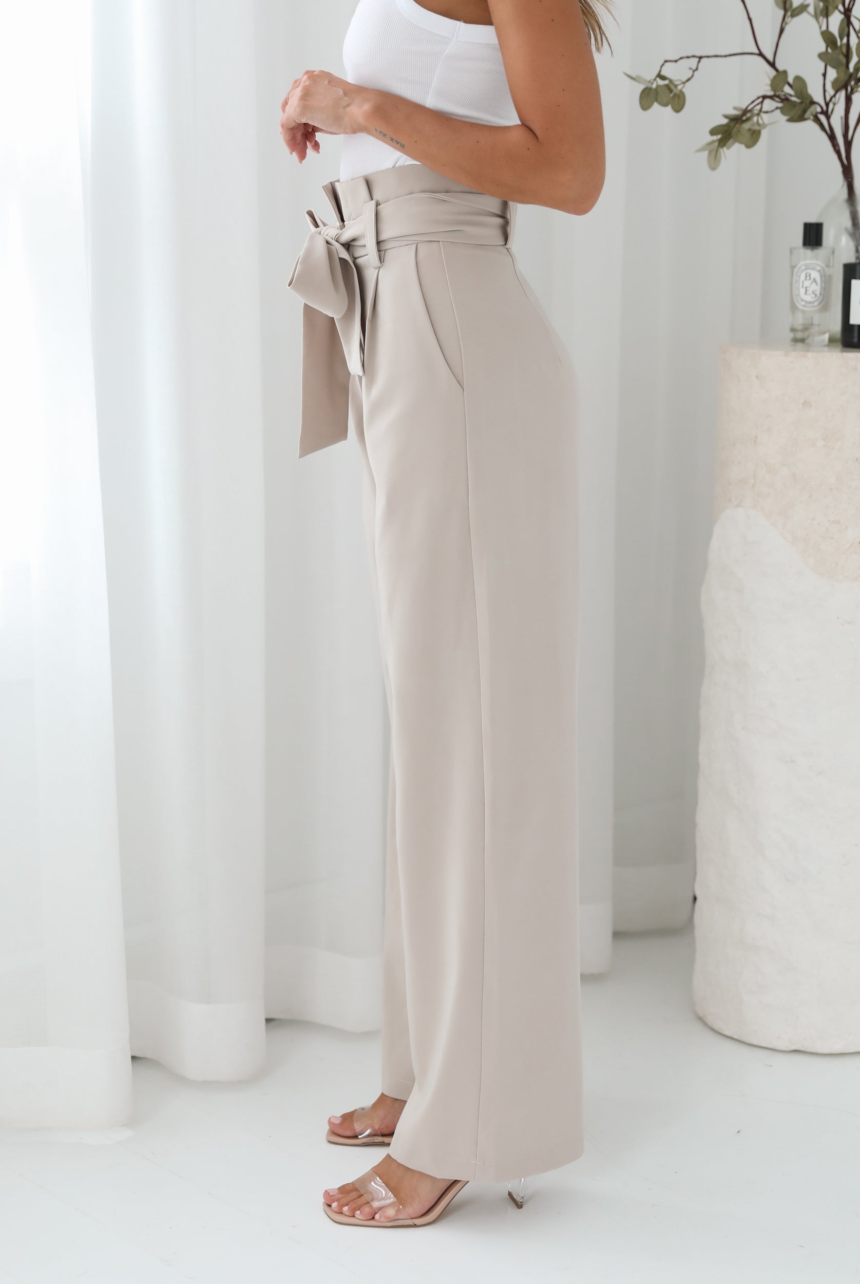 Alma Pants in Beige high waist wide leg trousers in beige side view