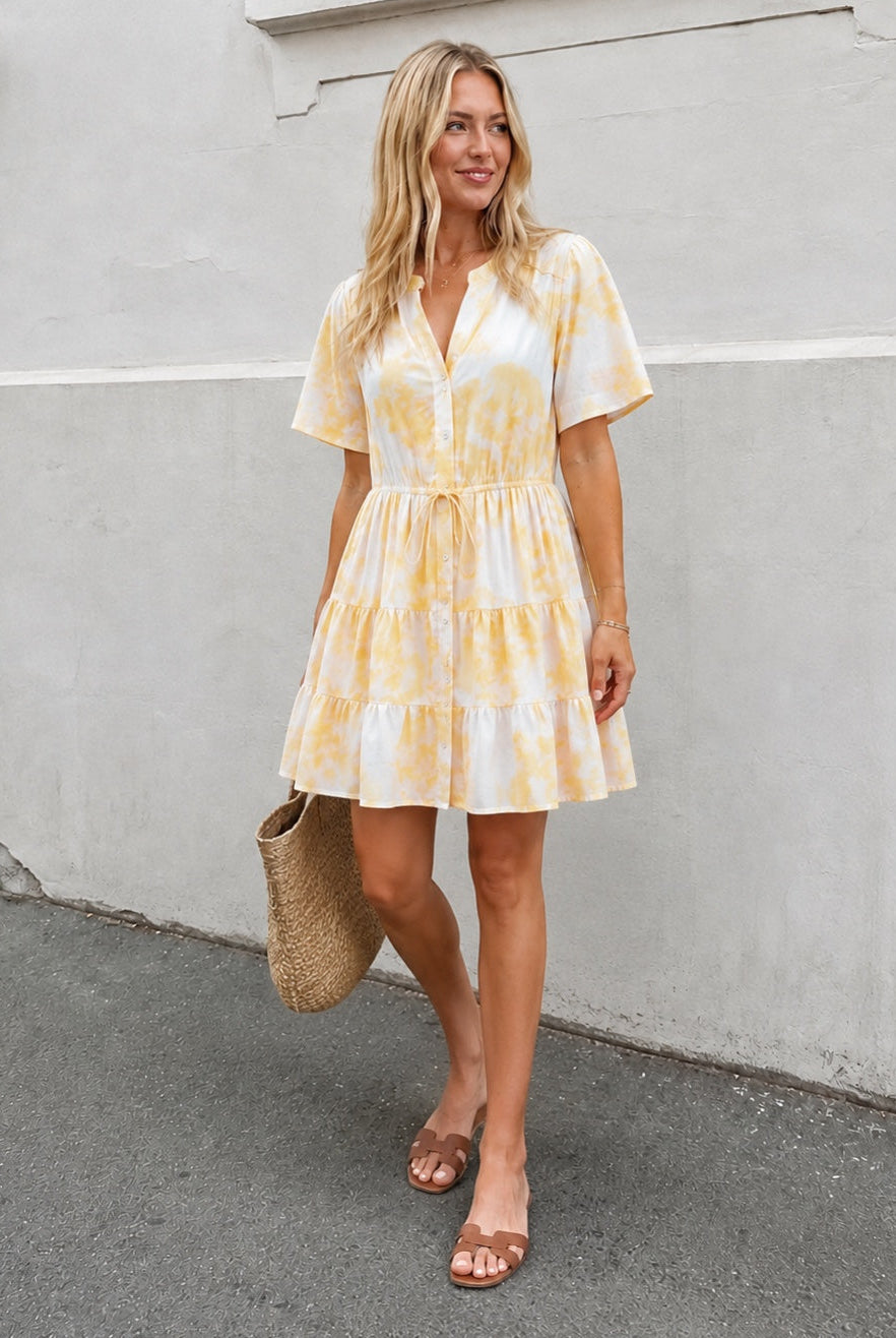 Women's printed mini dress with structured pleated bodice, the Sulani Dress in Sunkissed Gem by Esther & Co