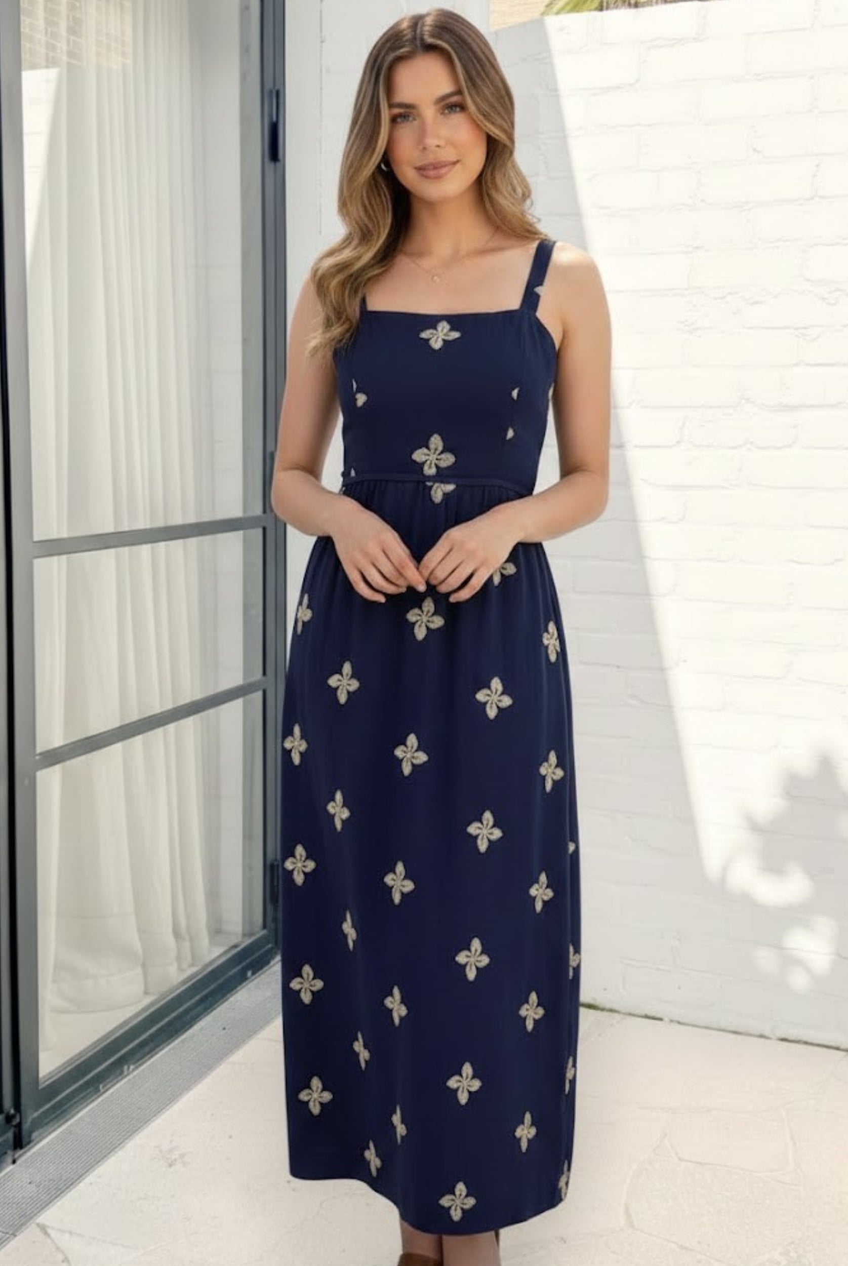 Women's navy floral maxi dress front view by Esther & Co