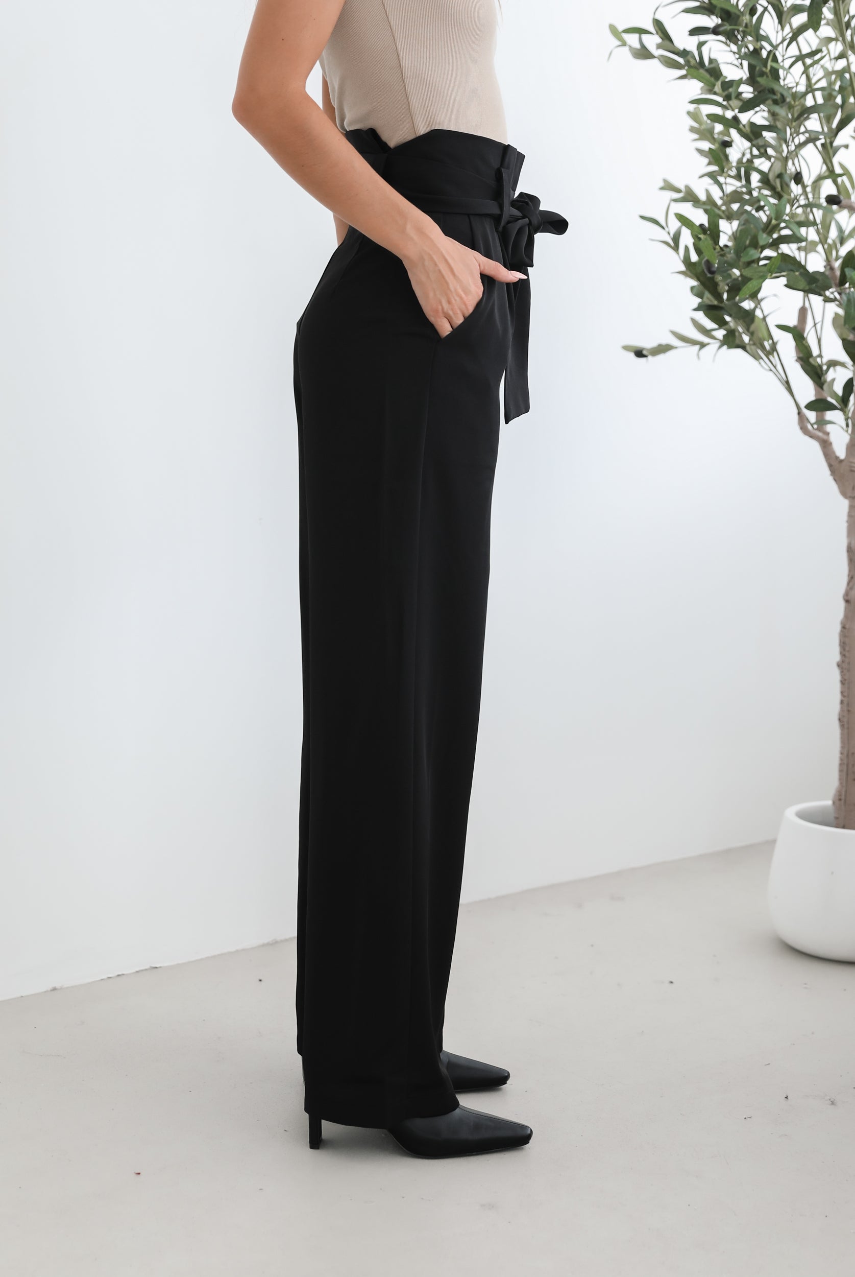 Alma Pants in Black black wide leg trousers with side pockets and detachable belt side view