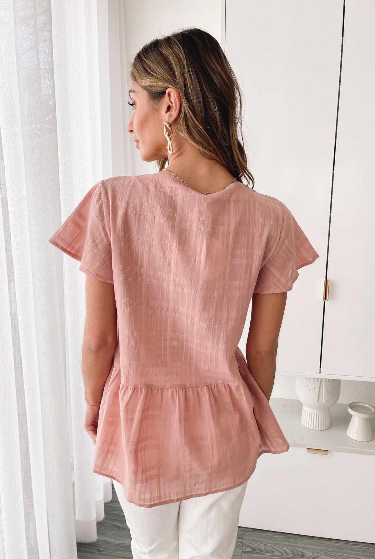 Arlo terracotta linen blouse styled with shorts