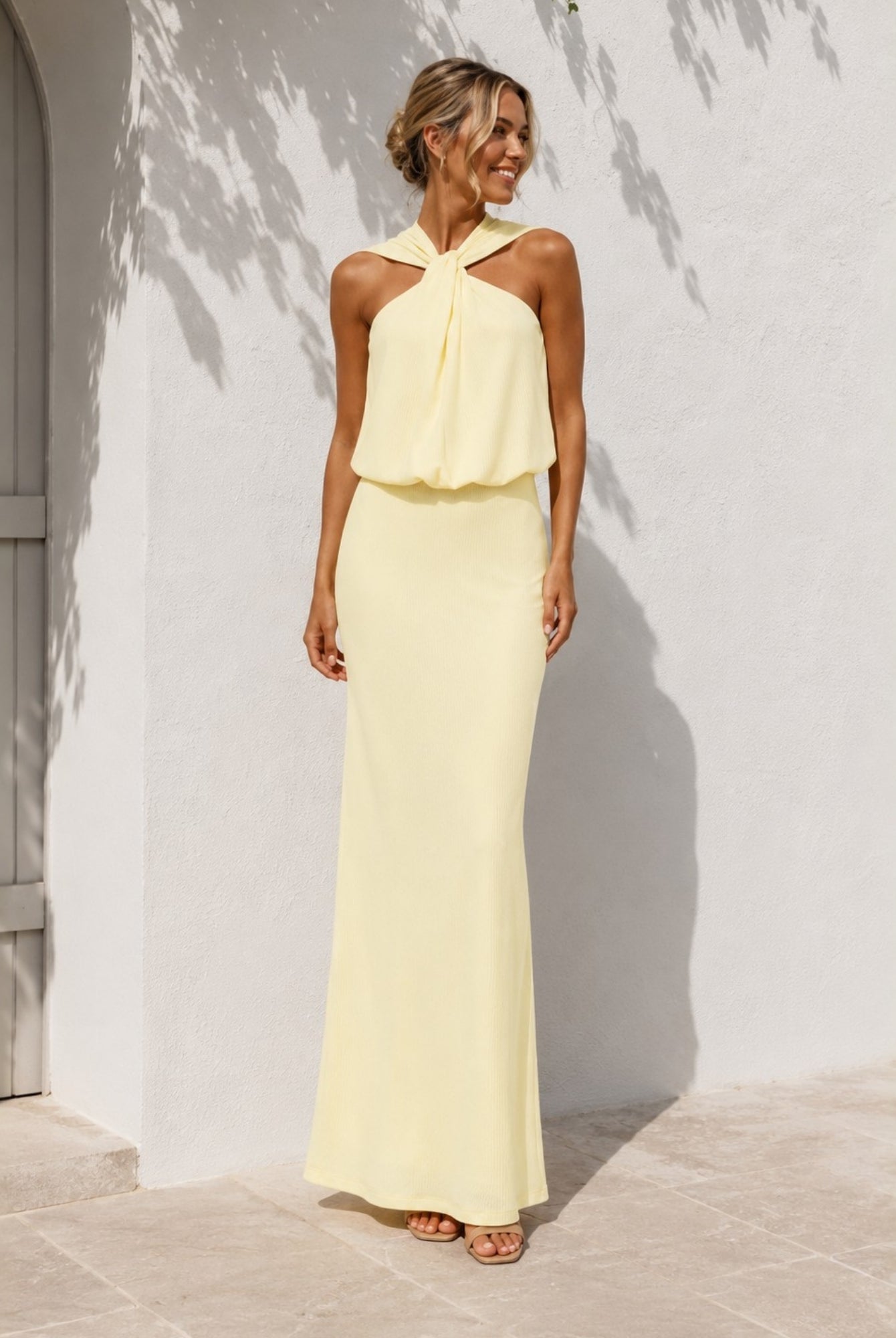 Women's lemon chiffon halter maxi dress, the Ashtine Dress in Lemon Chiffon by Esther & Co