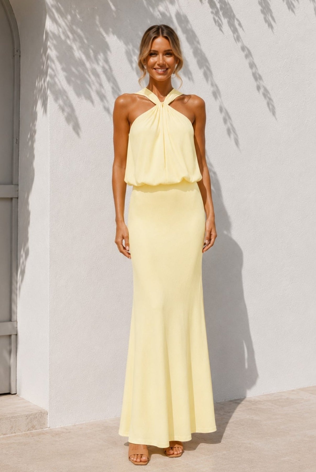 Women's yellow halter maxi dress front view by Esther & Co