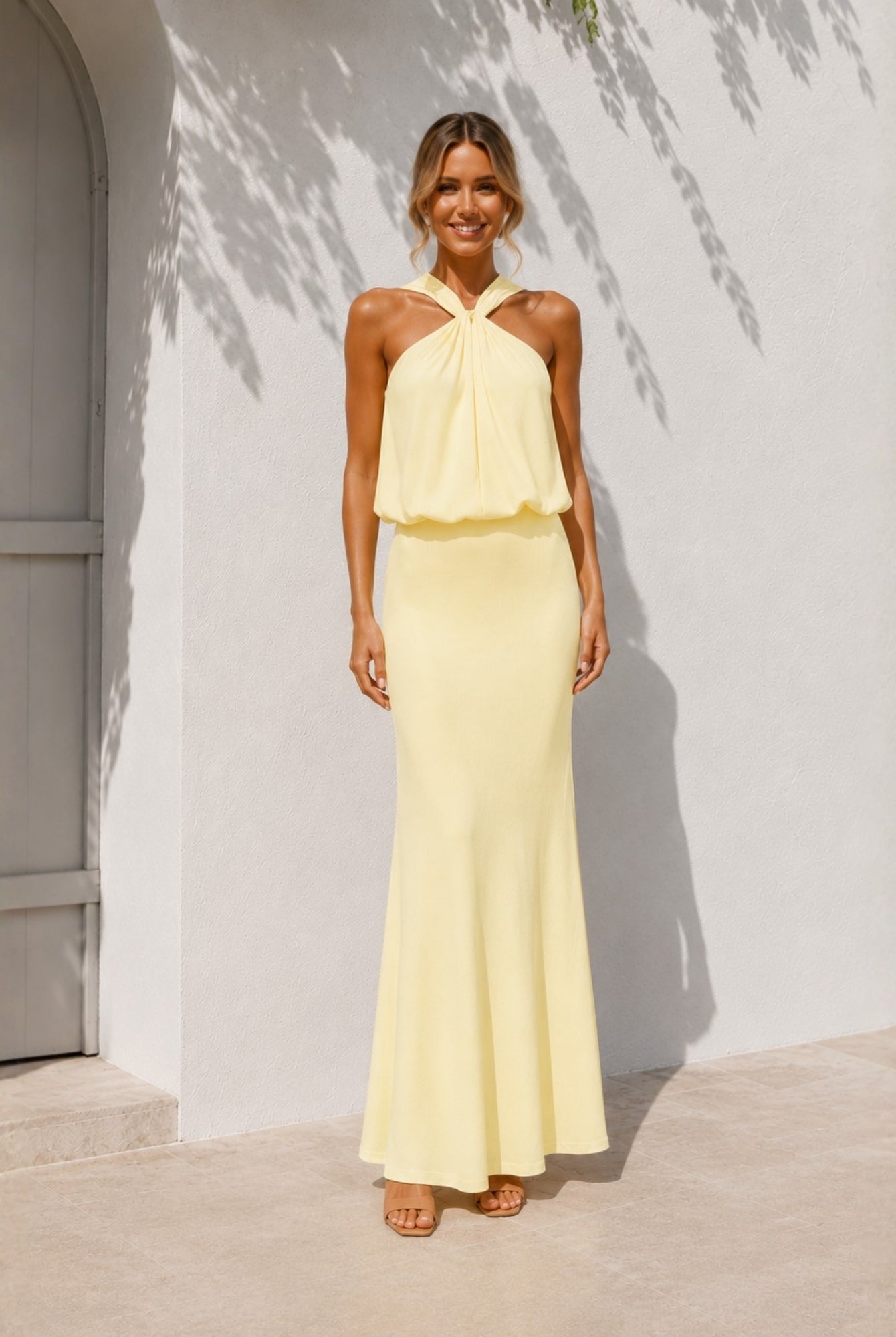 Women's yellow halter maxi dress front view by Esther & Co
