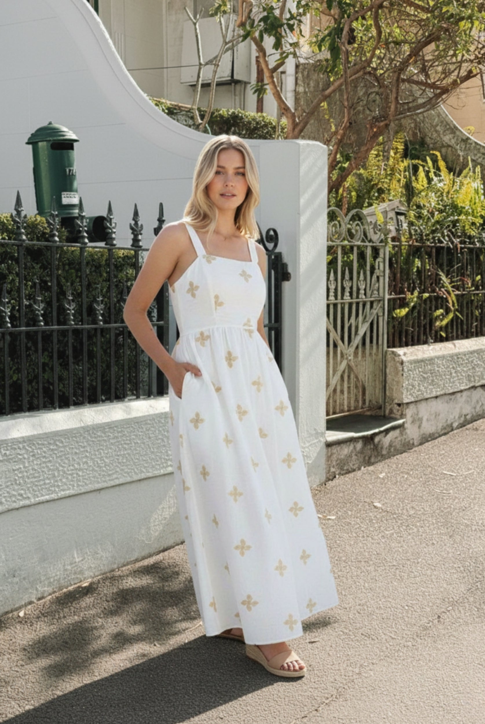 Women's white floral maxi dress styled outfit by Esther & Co