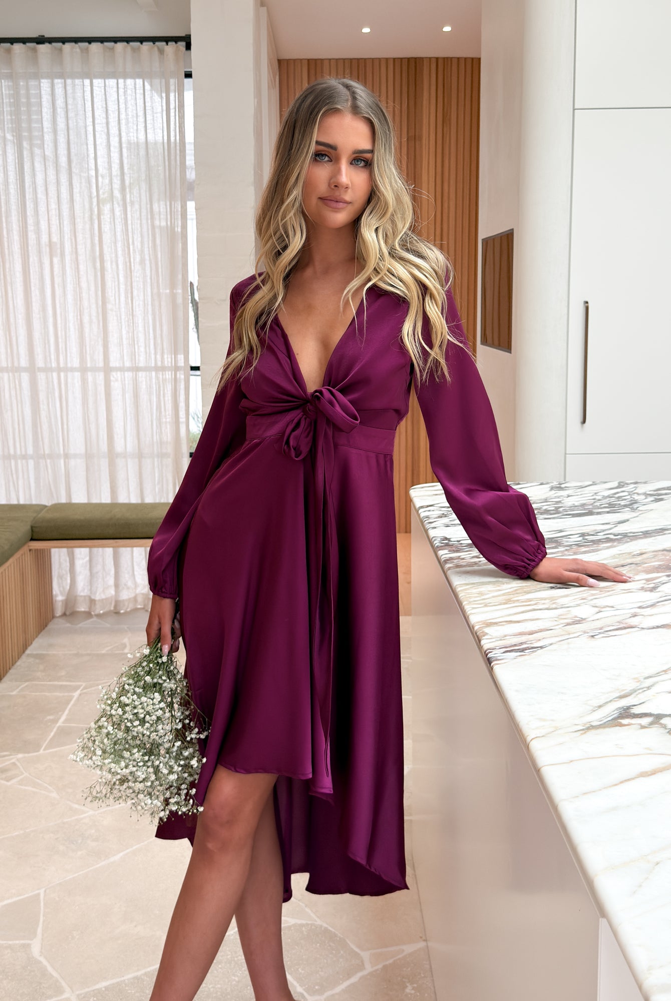 Front view of the Bryleigh Bordeaux Satin Formal Dress showing the plunge neckline and flowing silhouette