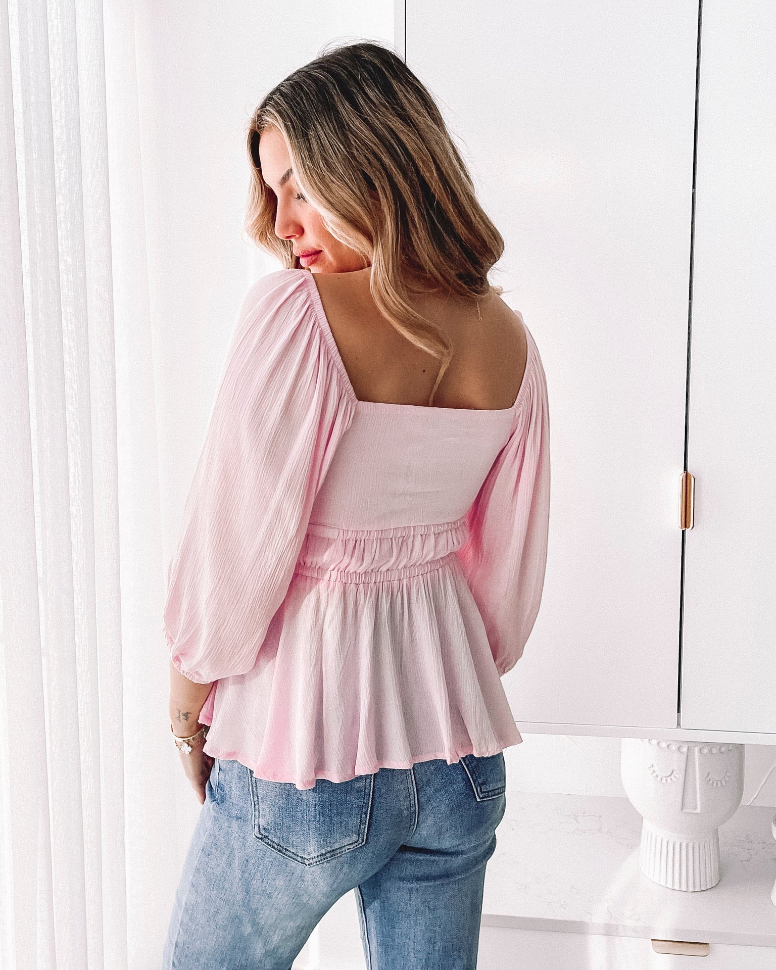 Front detail of the women's pink sweetheart top with cutout and tie by Esther & Co