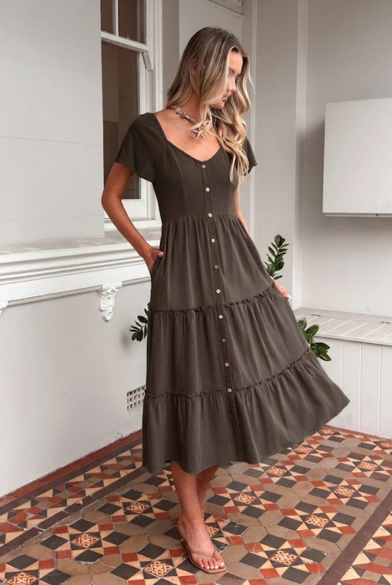 Celie cocoa linen midi dress with V neckline and button front, side view
