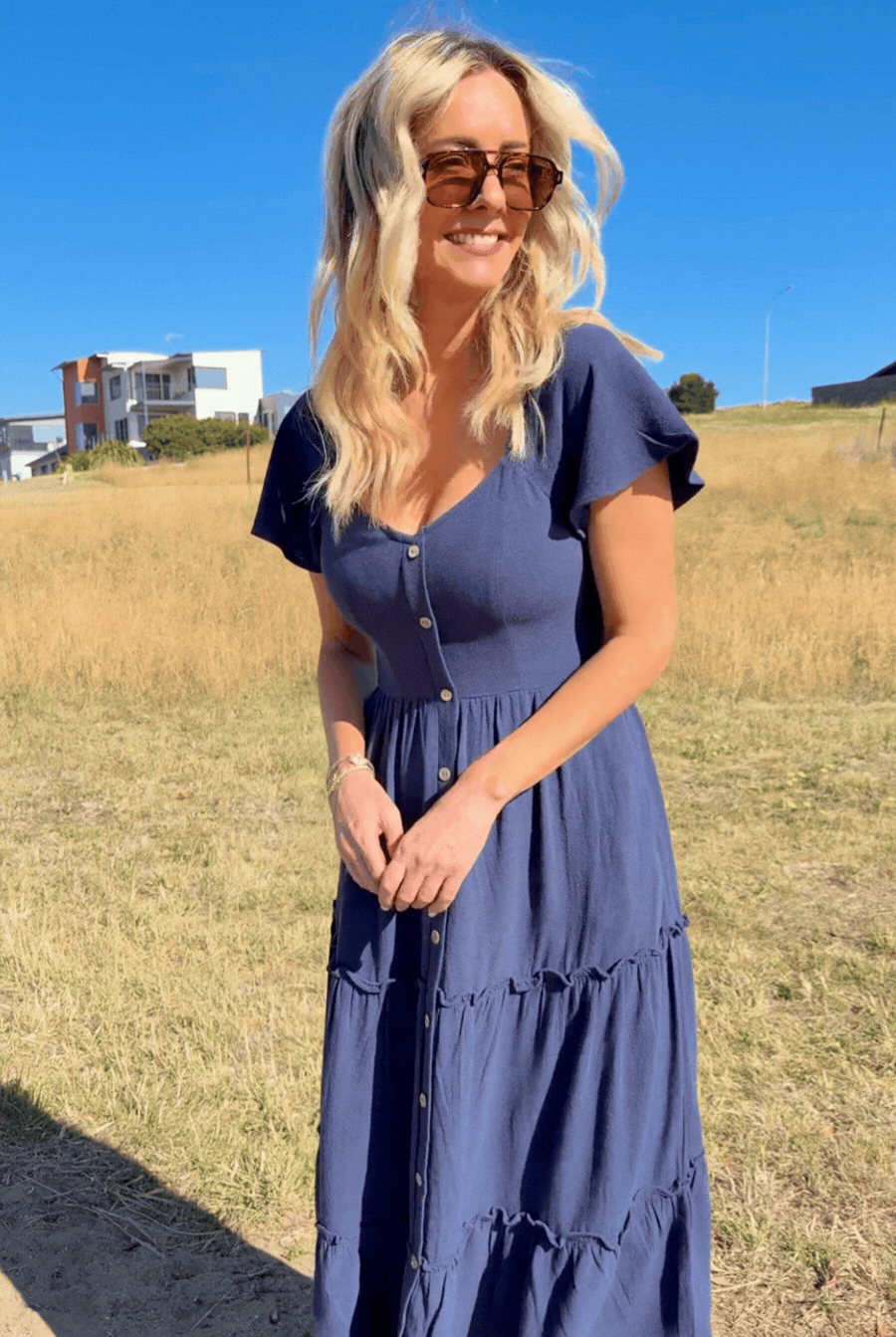 Celie navy linen midi dress, styled animation