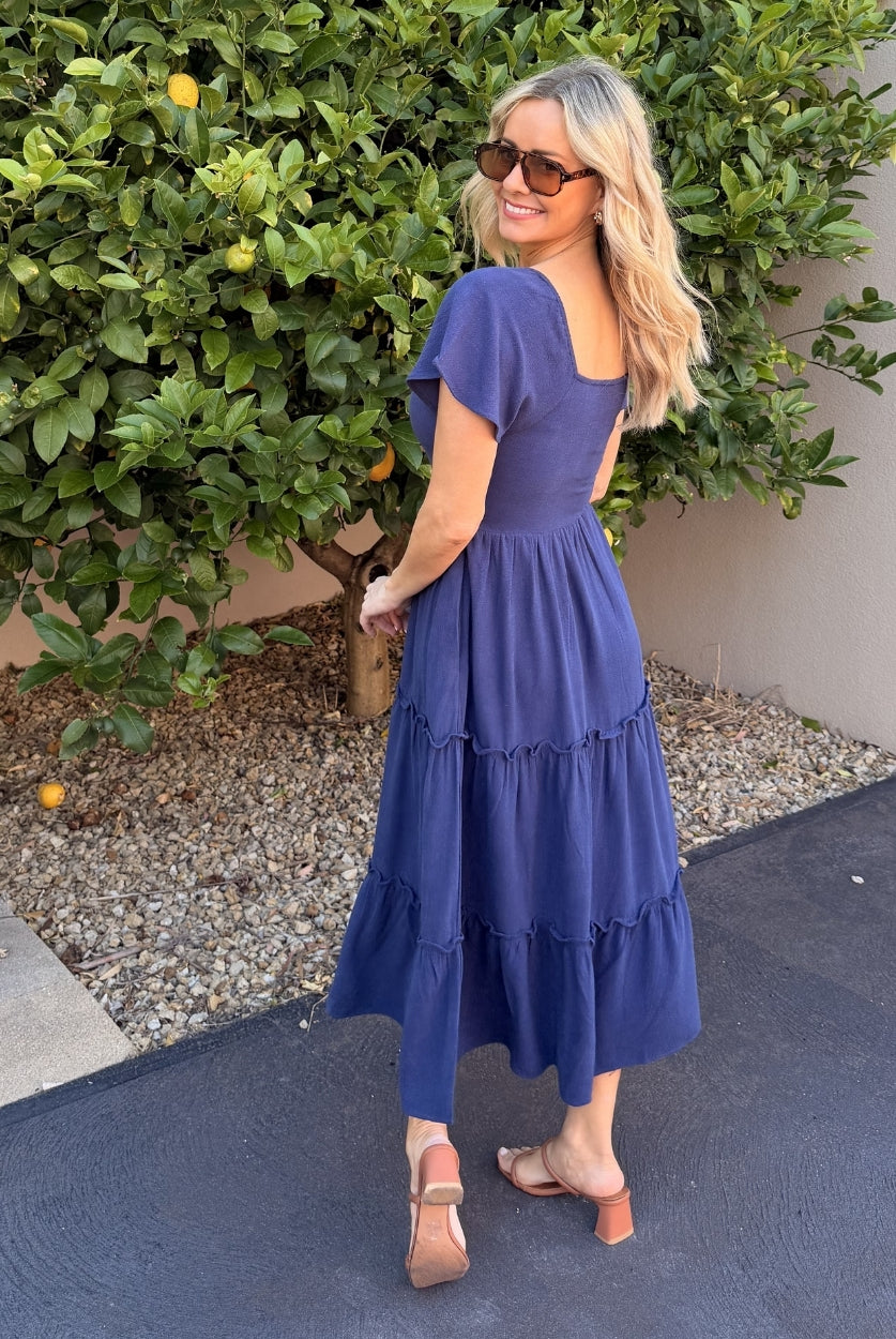 Celie navy linen midi dress with V-neckline, front view