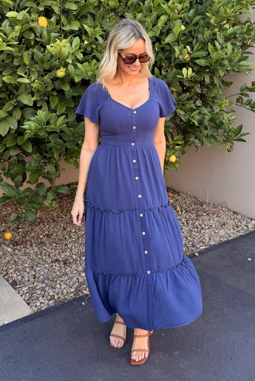 Celie navy tiered linen midi dress, styled view