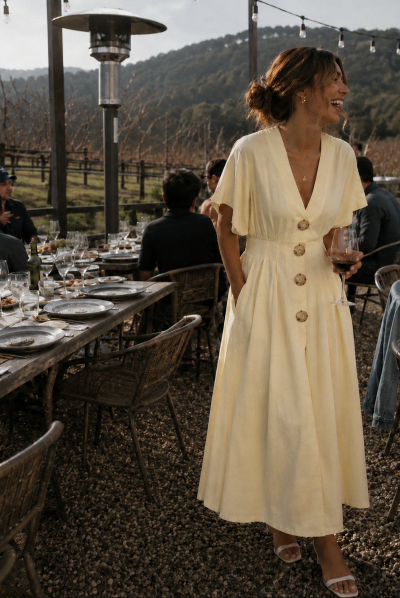 Women's buttercream yellow v-neck maxi dress with fitted waist panel, the Clairice Dress in Buttercream by Esther & Co