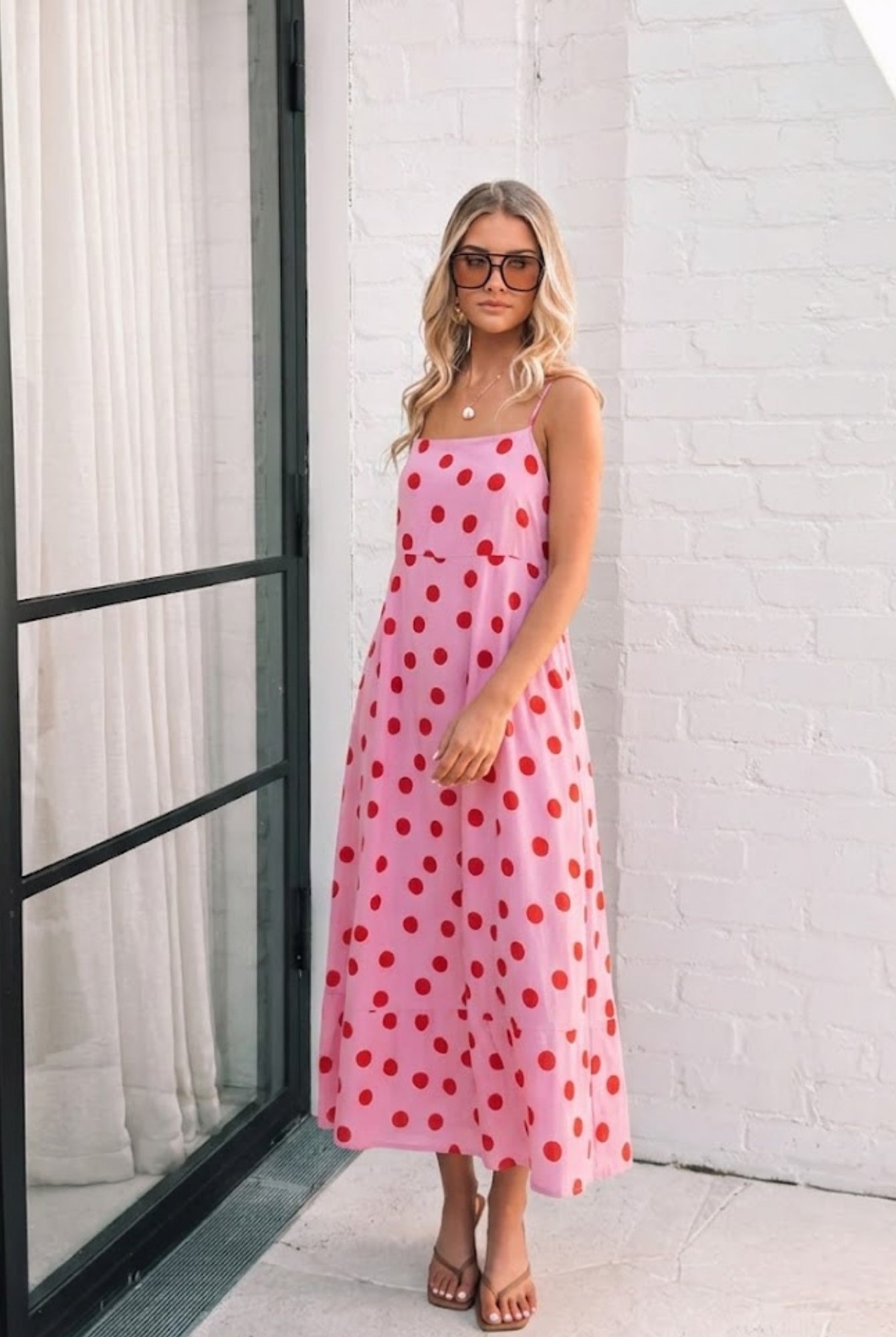 Women's pink polka dot midi dress, the Crescent Pink Spot Dress by Esther & Co
