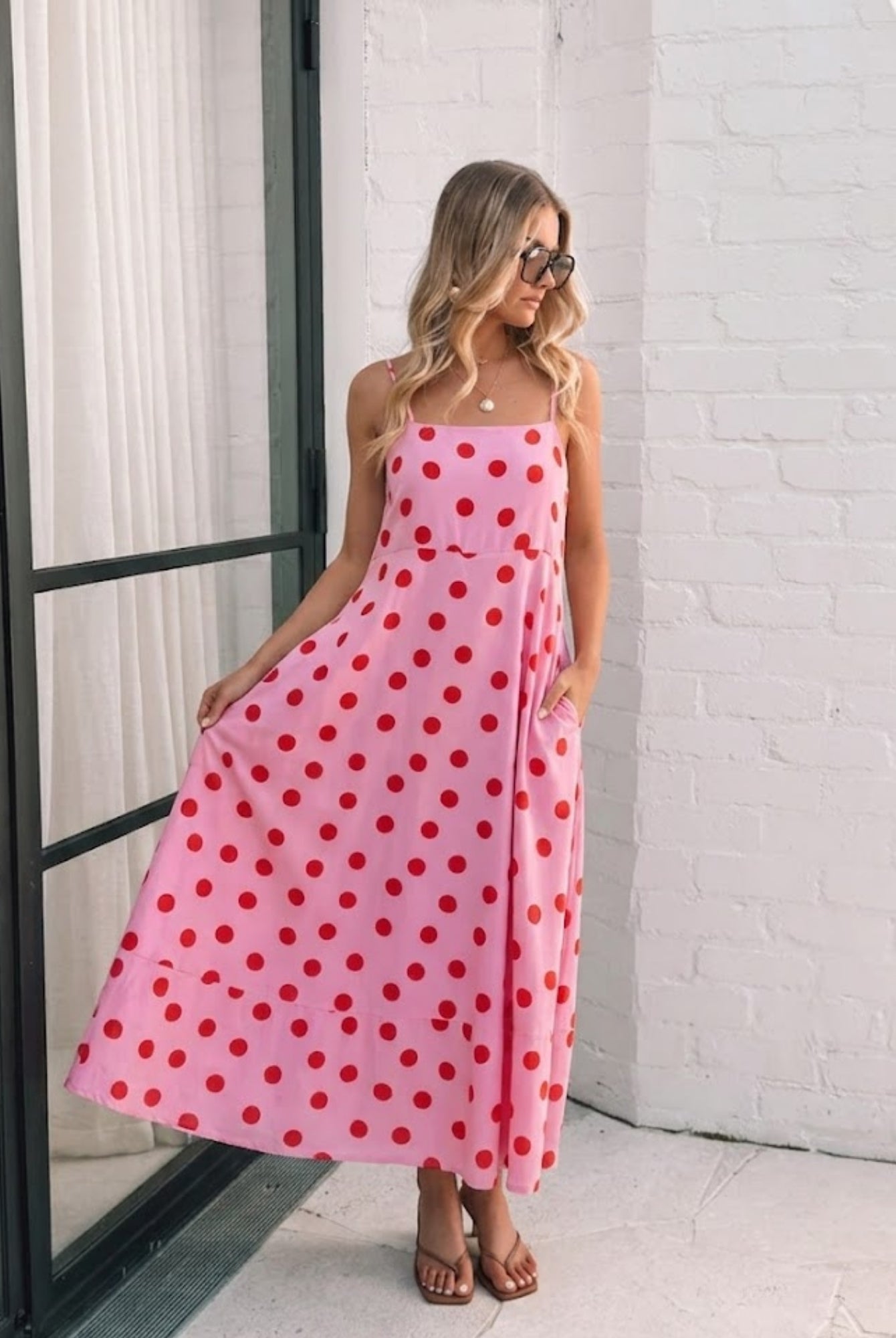 Women's pink spot midi dress front view by Esther & Co