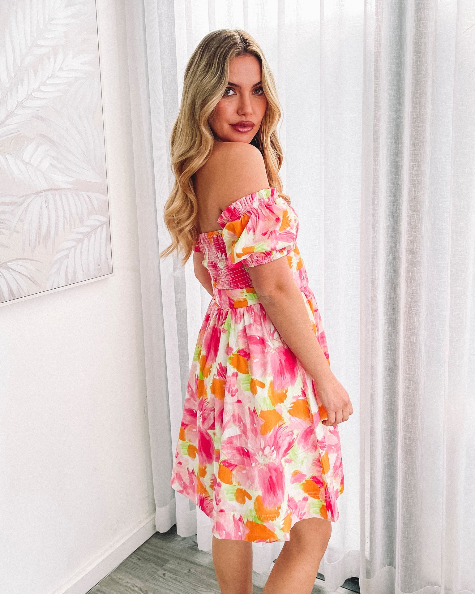 Women's pink floral print mini dress with waist tie by Esther & Co