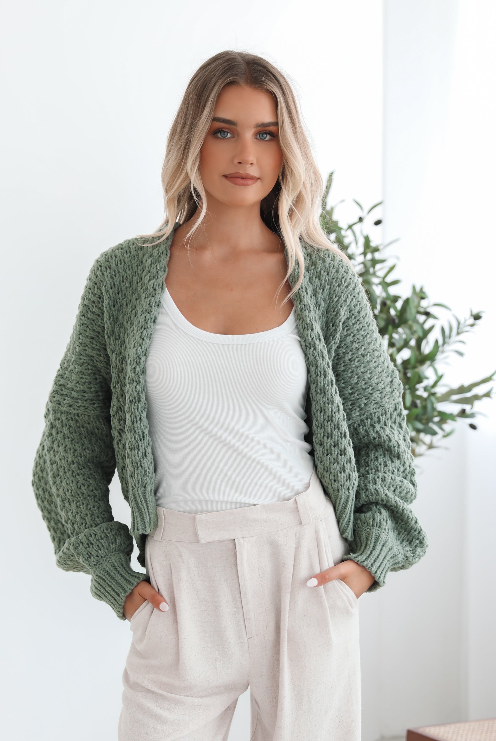 Dorine forest green open-front knit cardigan, styled view