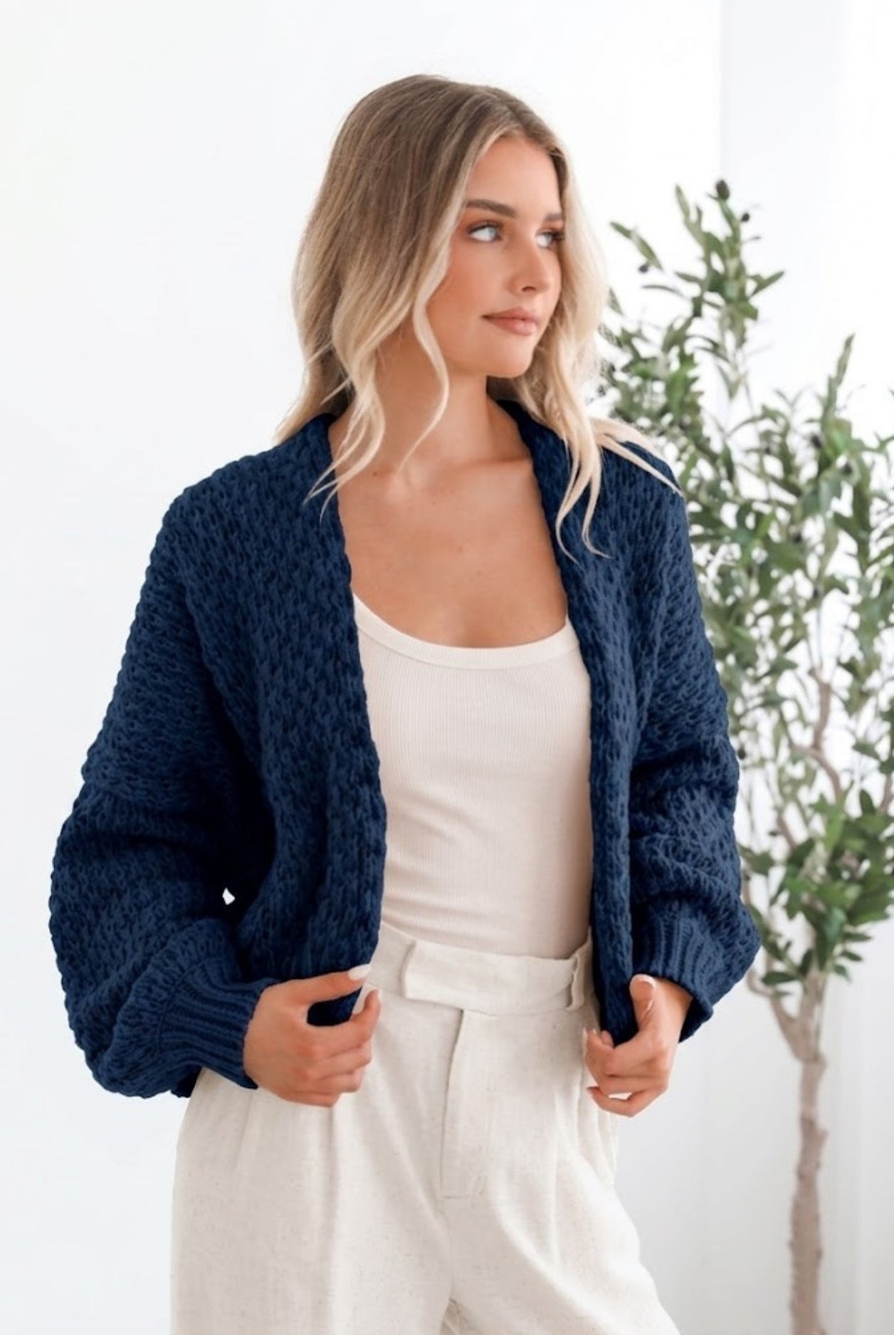 Dorine Cardigan in Navy navy knit cardigan side view