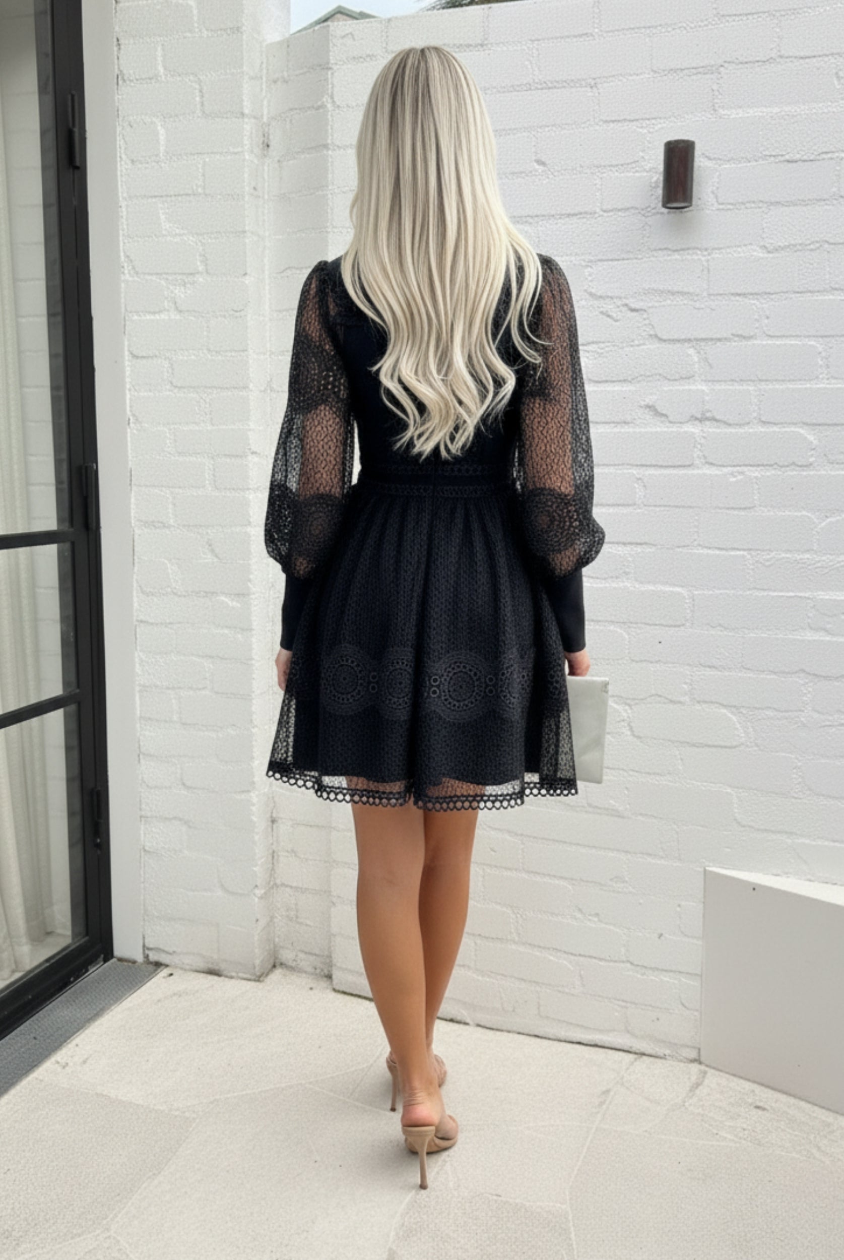 Eryndis Dress in Black womens black cut-out lace mini dress close up detail