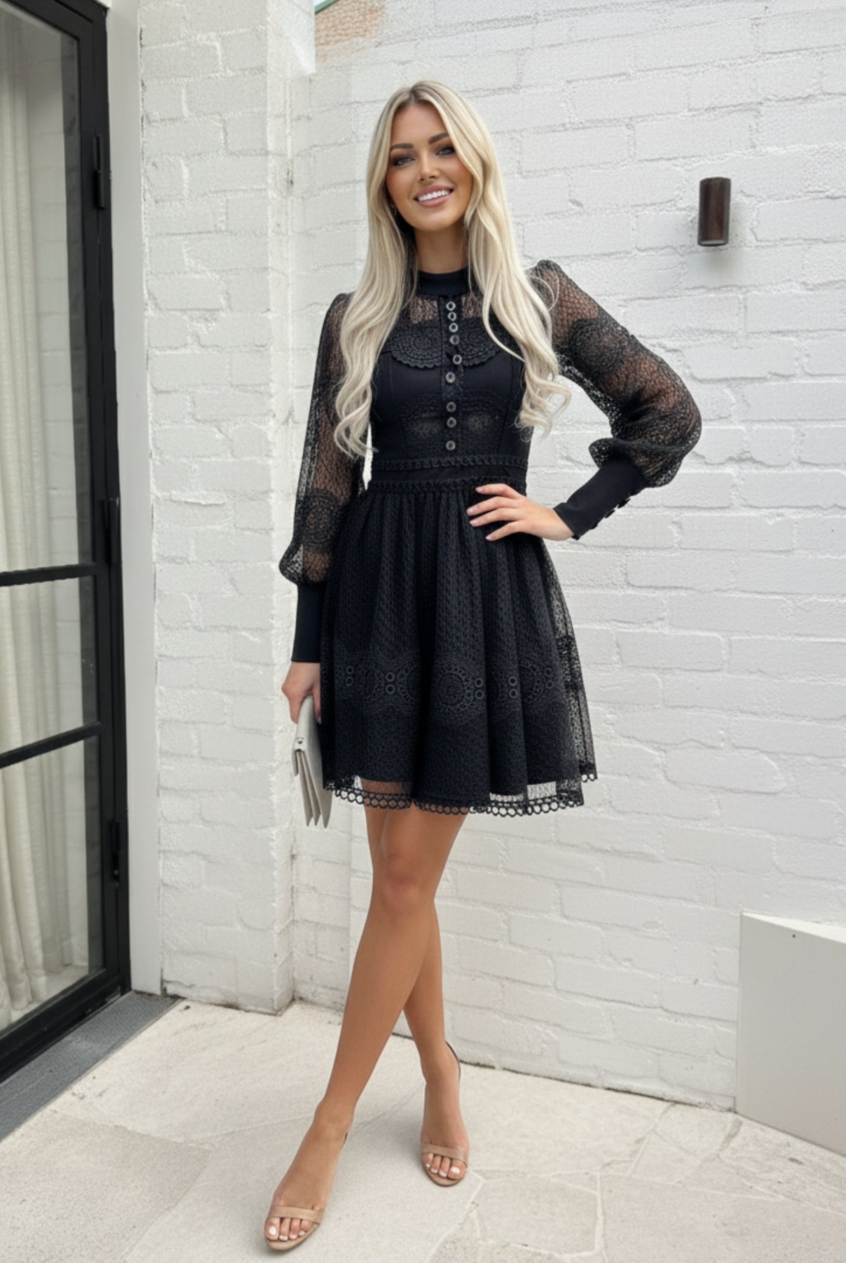Eryndis Dress in Black black lace mini with mock neckline and puff sleeves side view