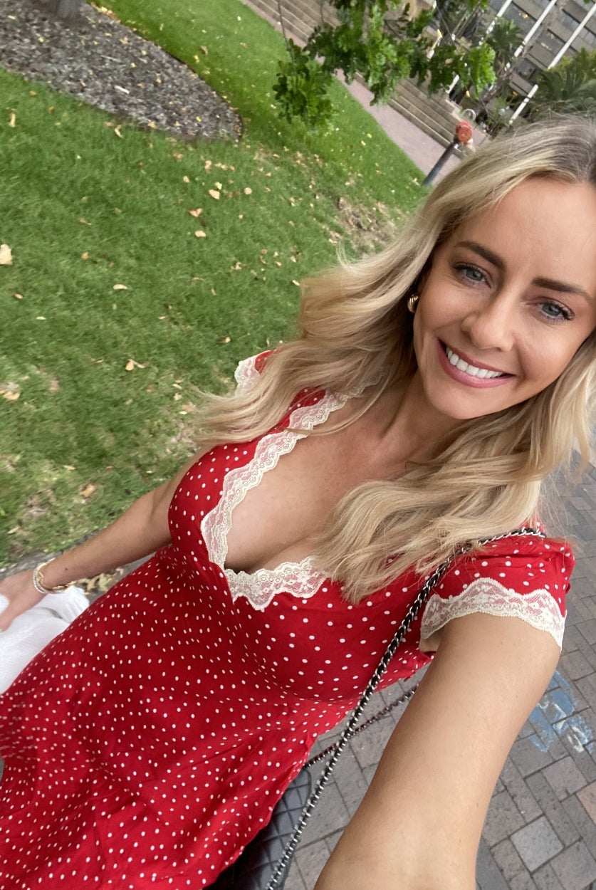 Women's red polka dot mini dress side view by Esther & Co