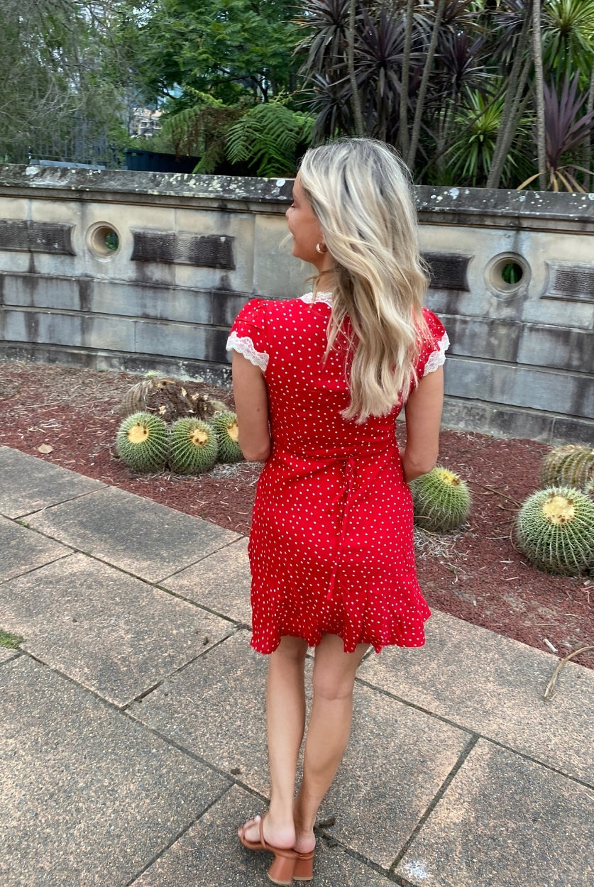Women's red polka dot mini dress styled outfit by Esther & Co