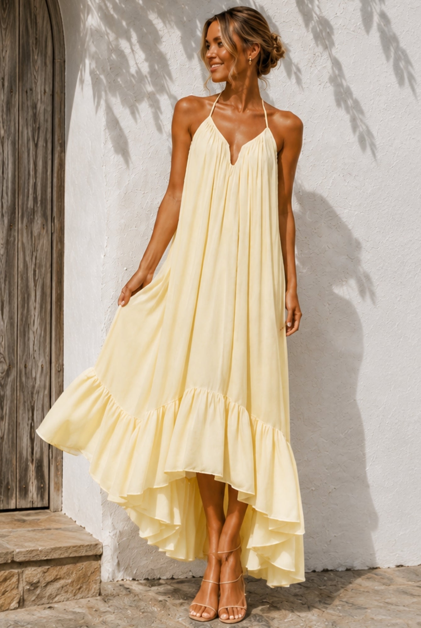 Women's pastel yellow high low maxi dress side view, the Flynne Dress in Sunrise Glow by Esther & Co