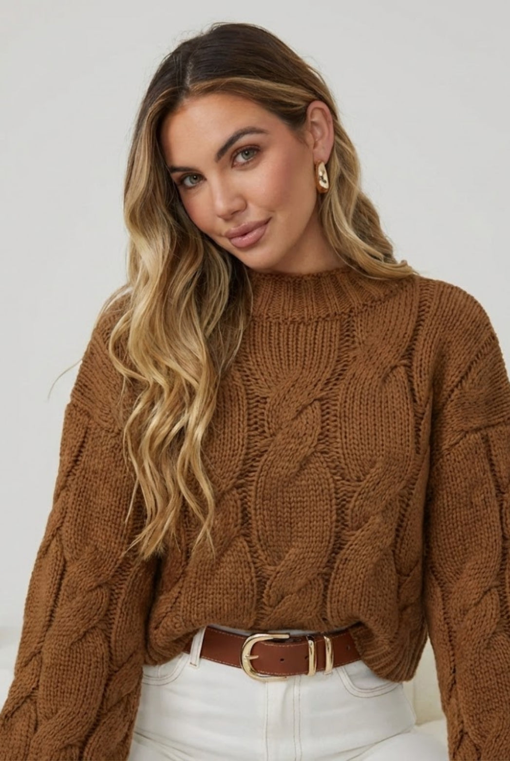 Hadi Knit in Cinnamon warm cinnamon cable knit jumper with high neckline side view