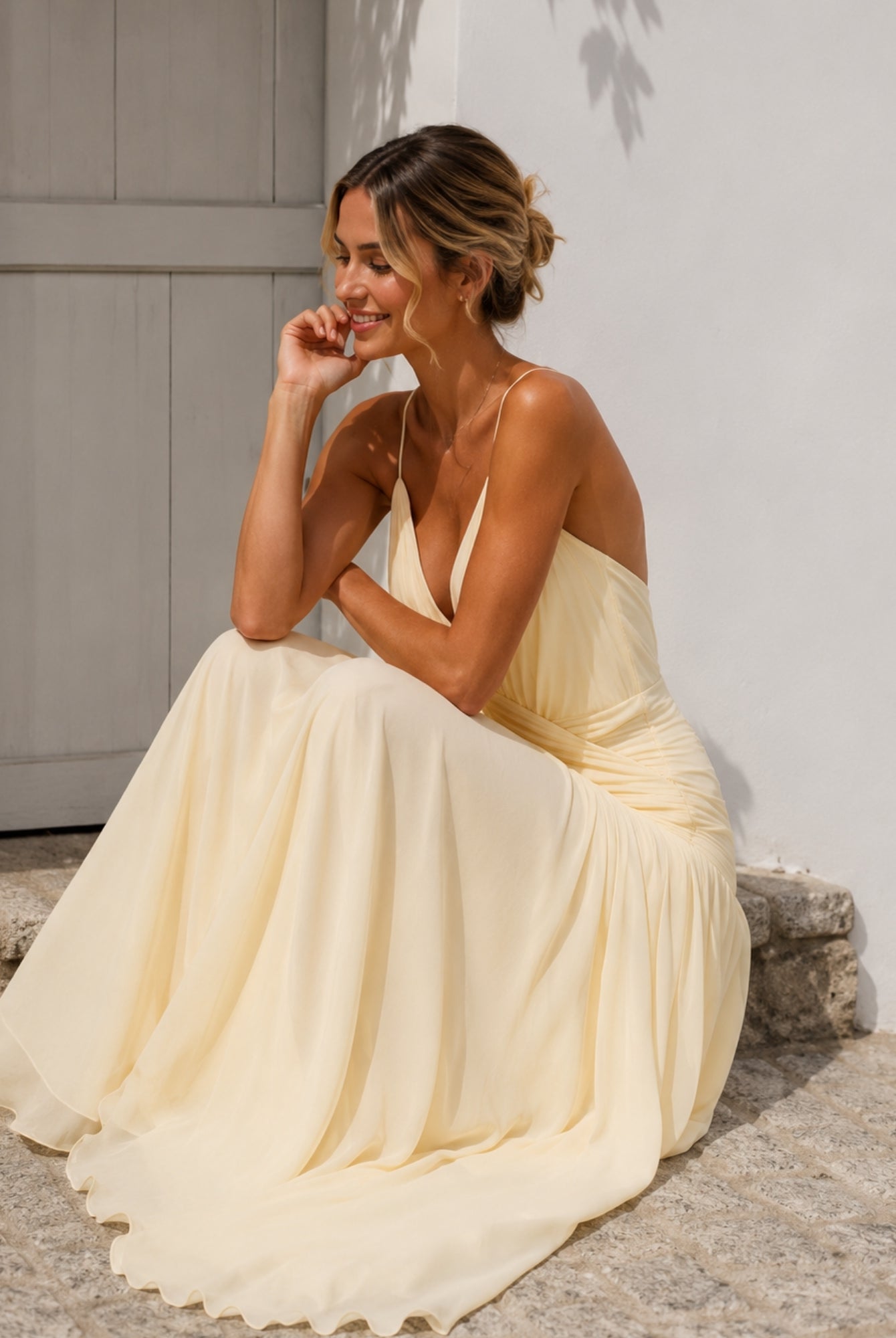 Women's pastel yellow plunge neck maxi dress, the Hermione Dress in Sunlit Veil by Esther & Co