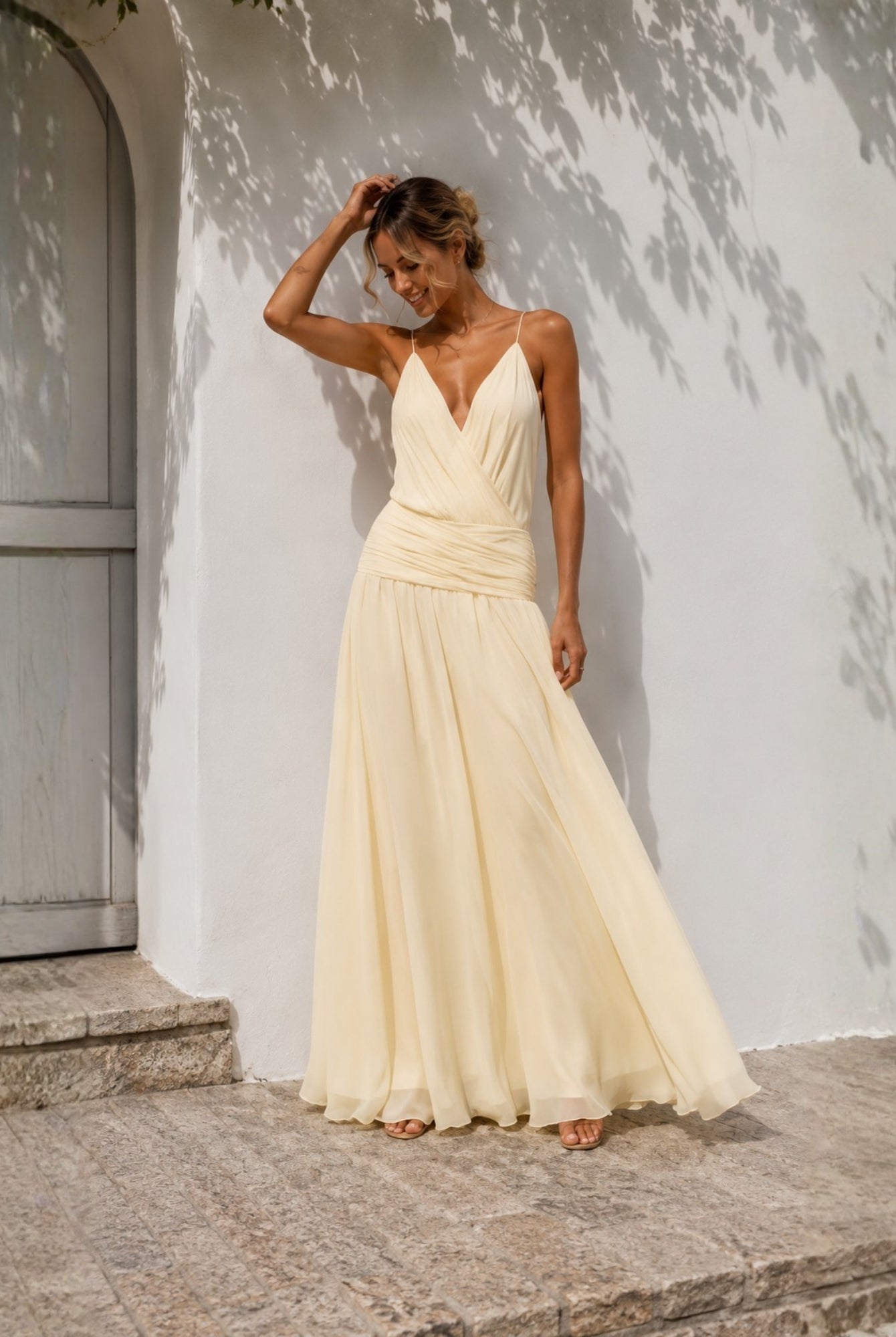 Women's pastel yellow plunge neck maxi dress, the Hermione Dress in Sunlit Veil by Esther & Co