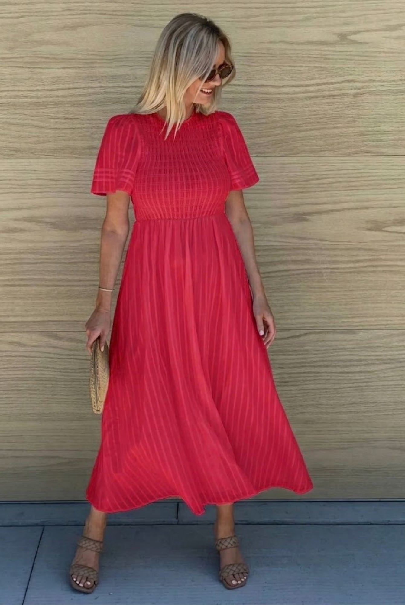 Women's flowy cherry red cotton dress styled for day to evening by Esther & Co