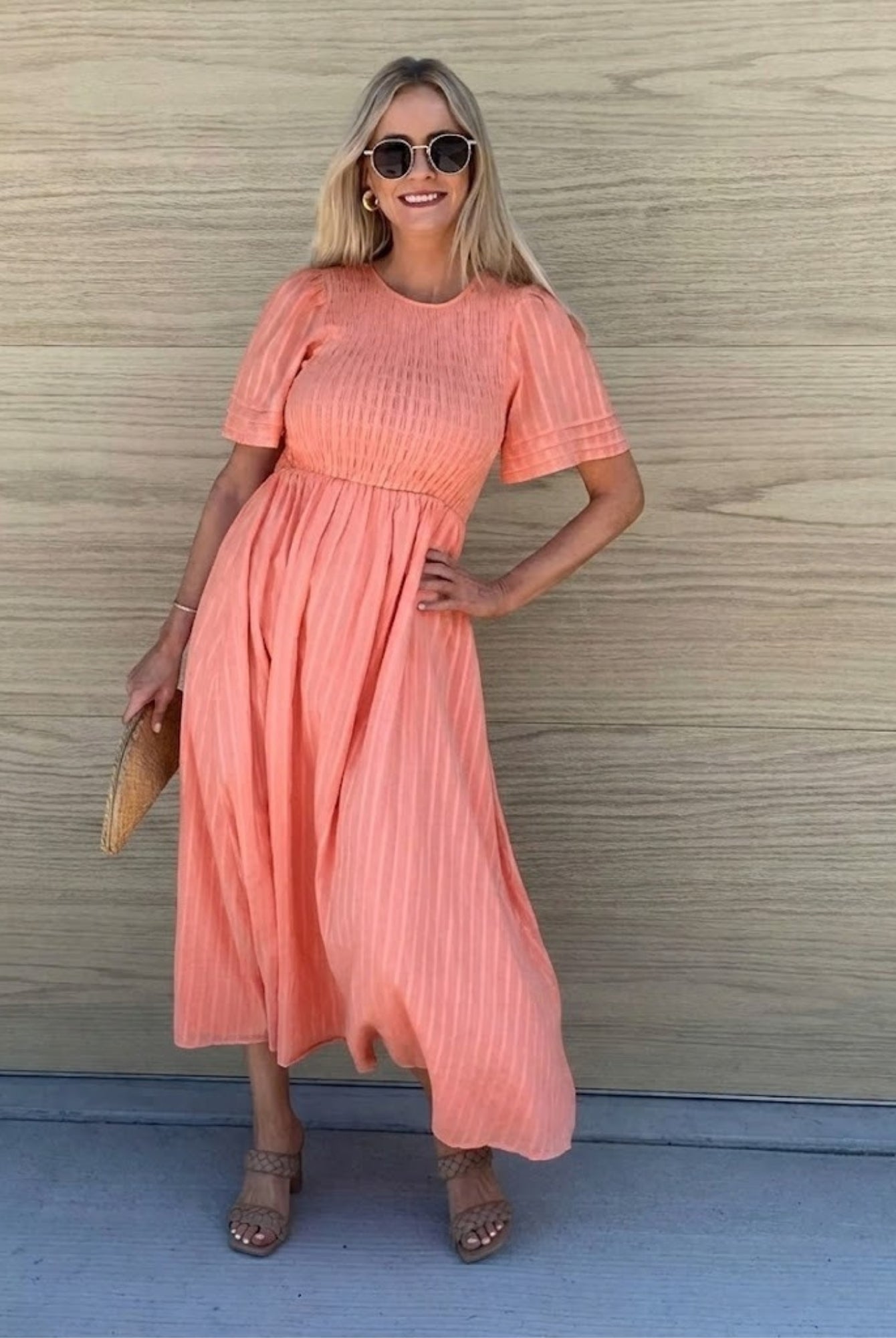 Women's coral cotton midi dress with smocked bodice, the Iolana Dress in Coral by Esther & Co