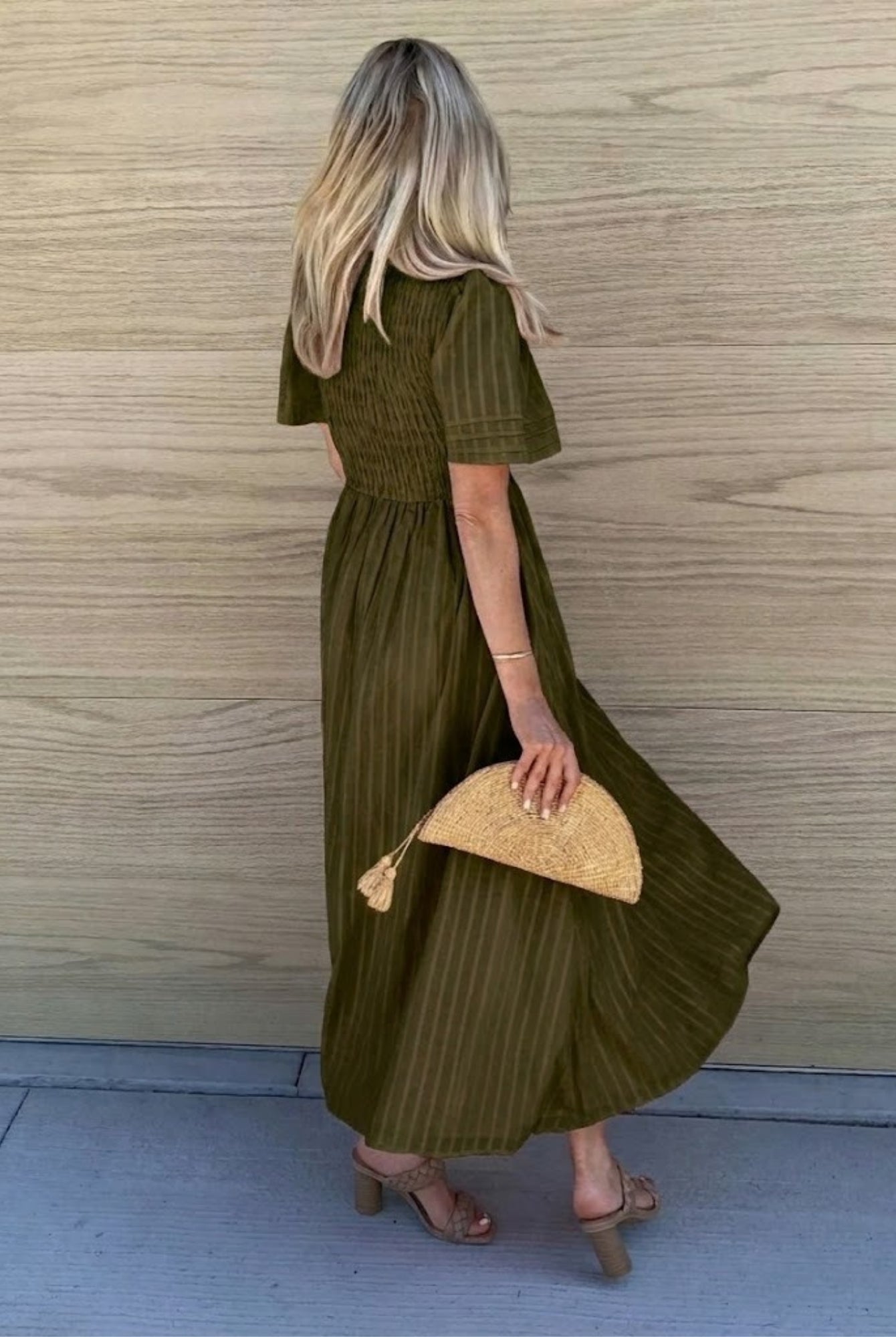 Women's flowy dark olive cotton dress styled for day to evening by Esther & Co