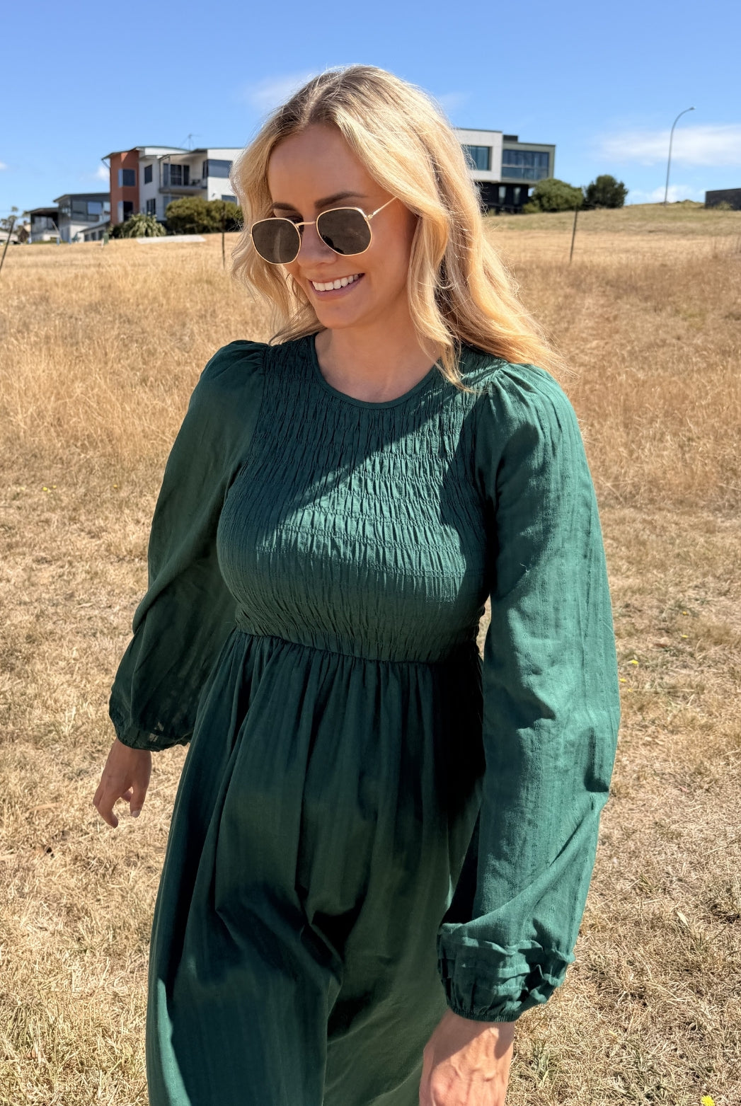 Iolana Dress in Deep Green Long Sleeve deep green shirred midi dress close up detail