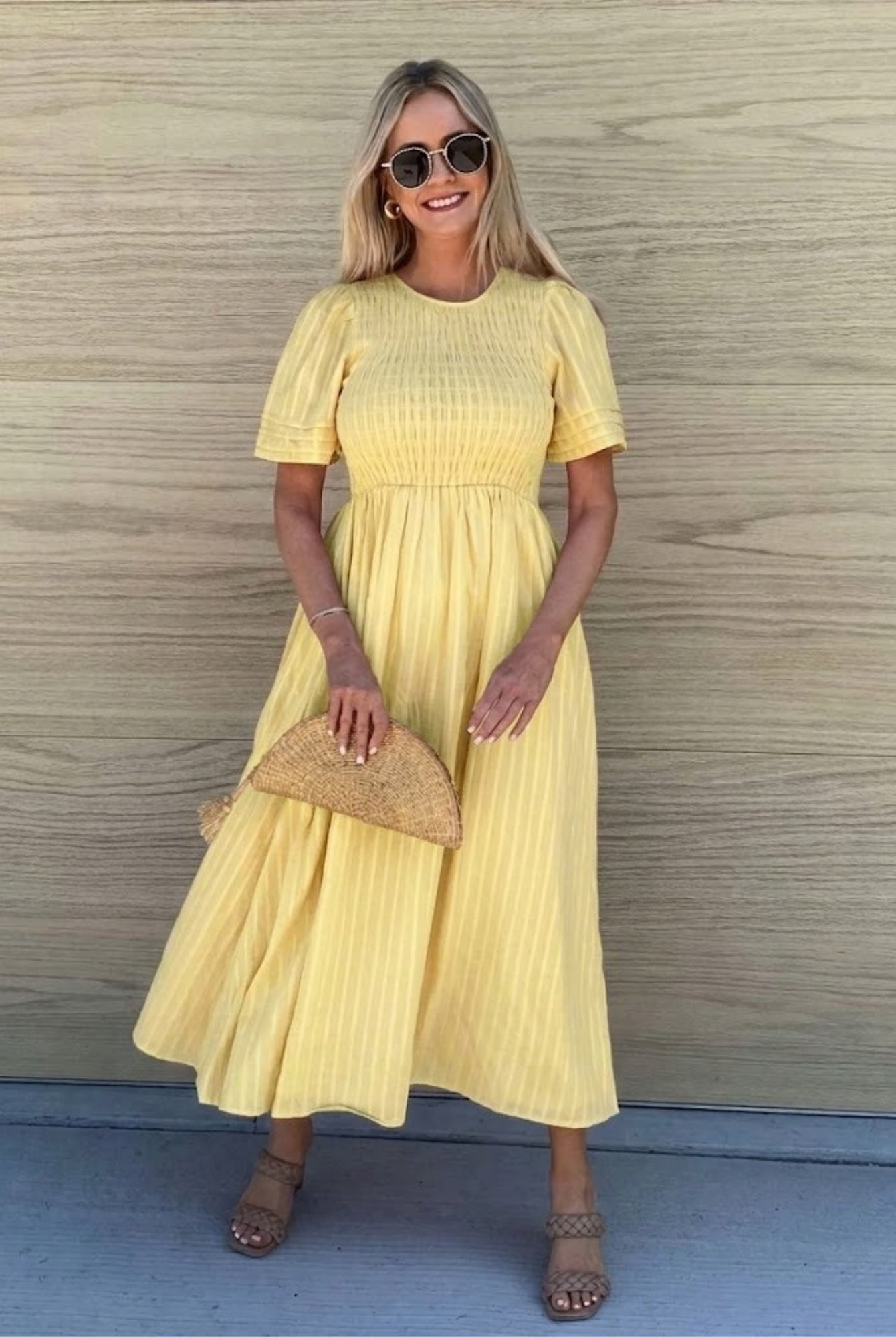Women's yellow cotton midi dress with shirred bodice and flutter sleeves, the Iolana Dress in Sunshine by Esther & Co