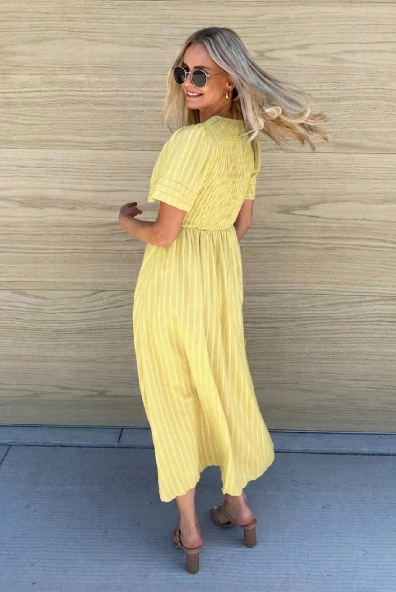 Women's flowy yellow cotton dress with vertical pinstripe texture by Esther & Co
