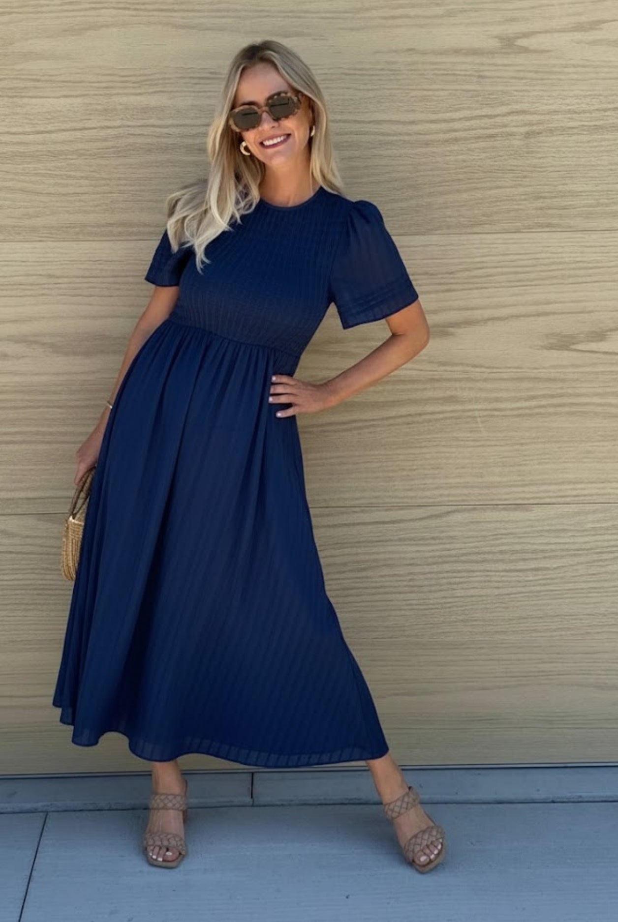 Women's navy shirred A-line cotton midi dress front view by Esther & Co