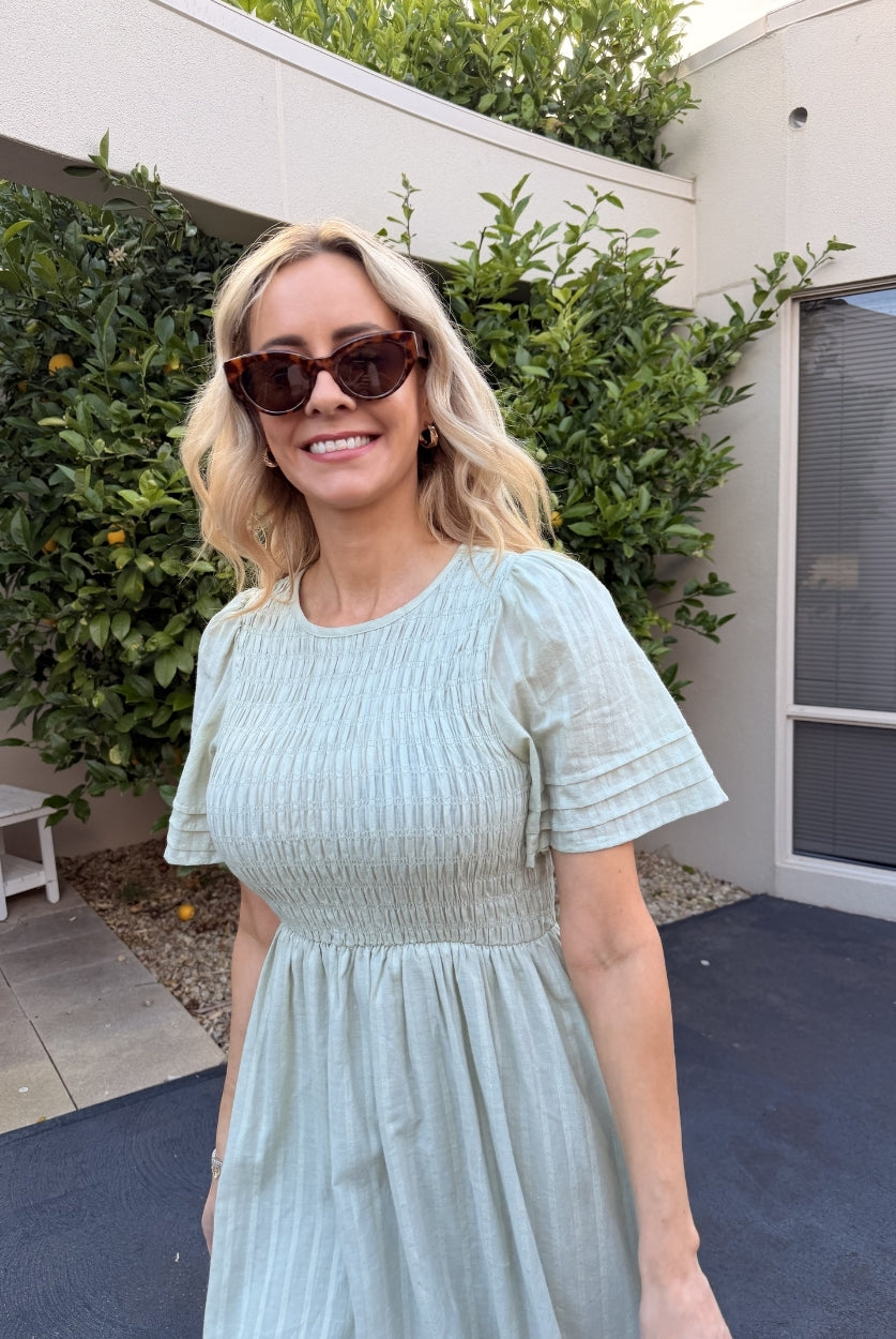 Iolana Dress in Soft Khaki soft khaki cotton midi dress side view