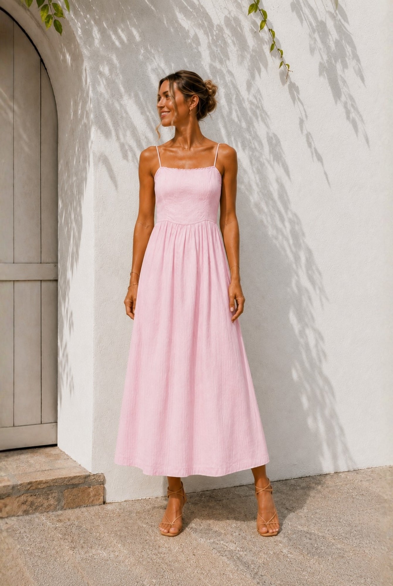 Women's pastel pink midi dress with fitted panelled bodice by Esther & Co