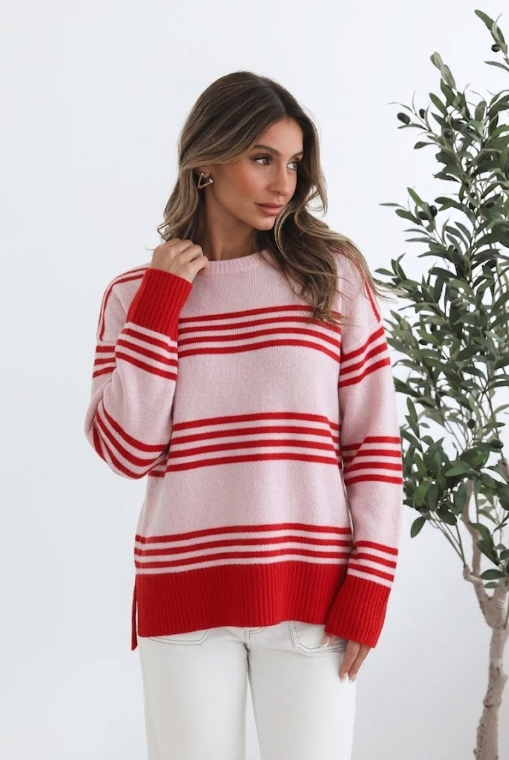Women's pink stripe knit jumper front view by Esther & Co