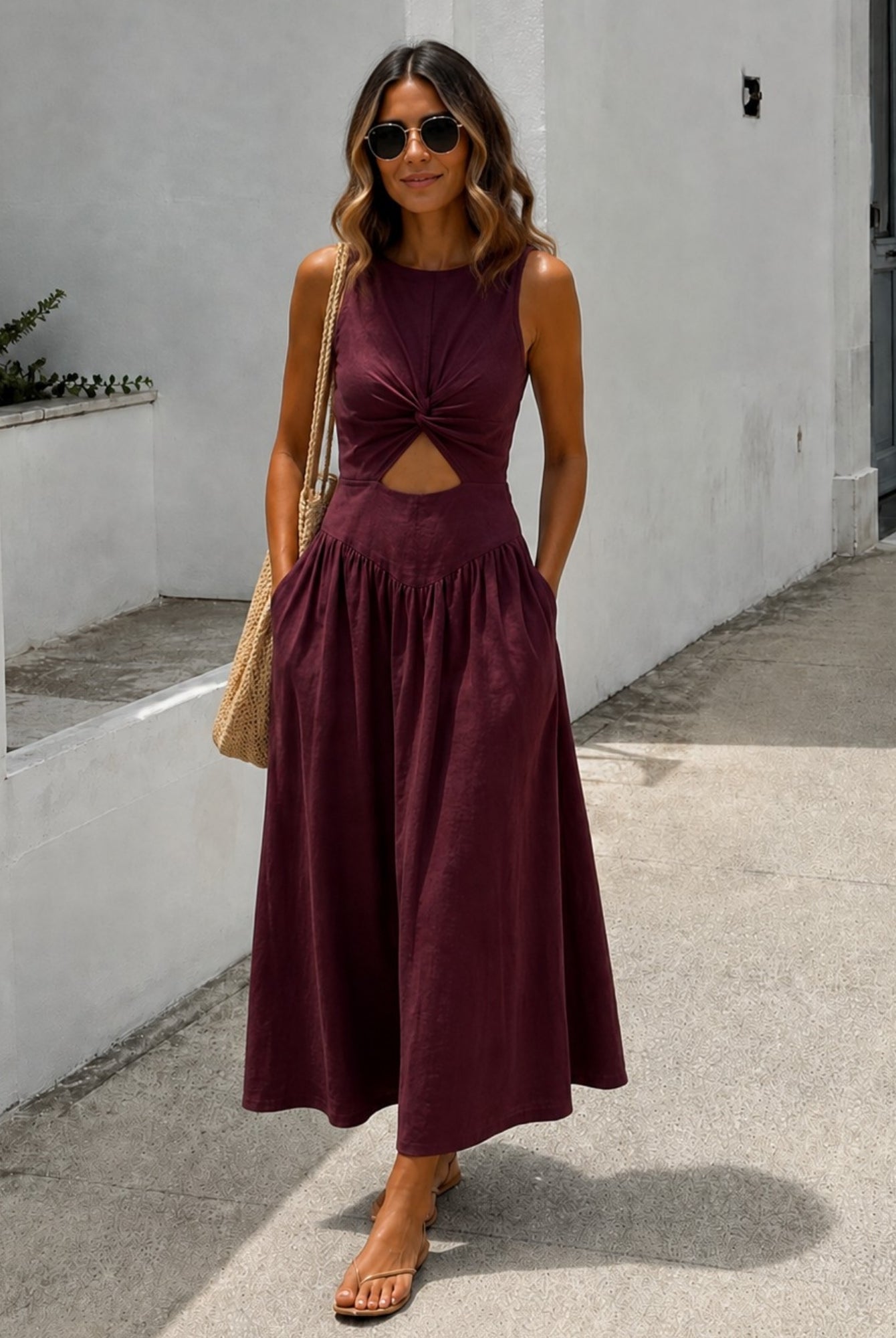 Women's plum sleeveless linen midi dress front view, the Kirah Dress in Plum by Esther & Co