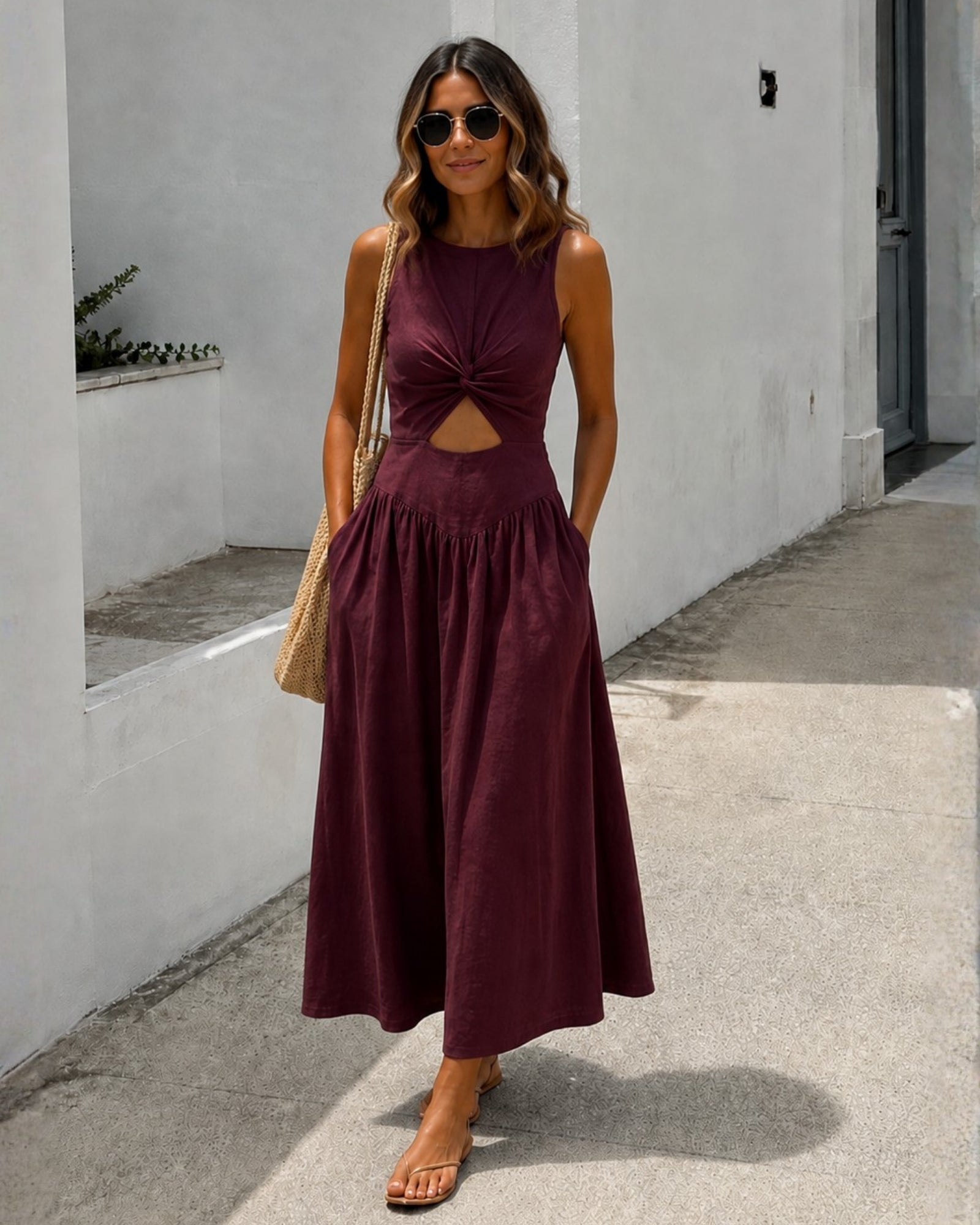 Women's plum sleeveless linen midi dress front view, the Kirah Dress in Plum by Esther & Co