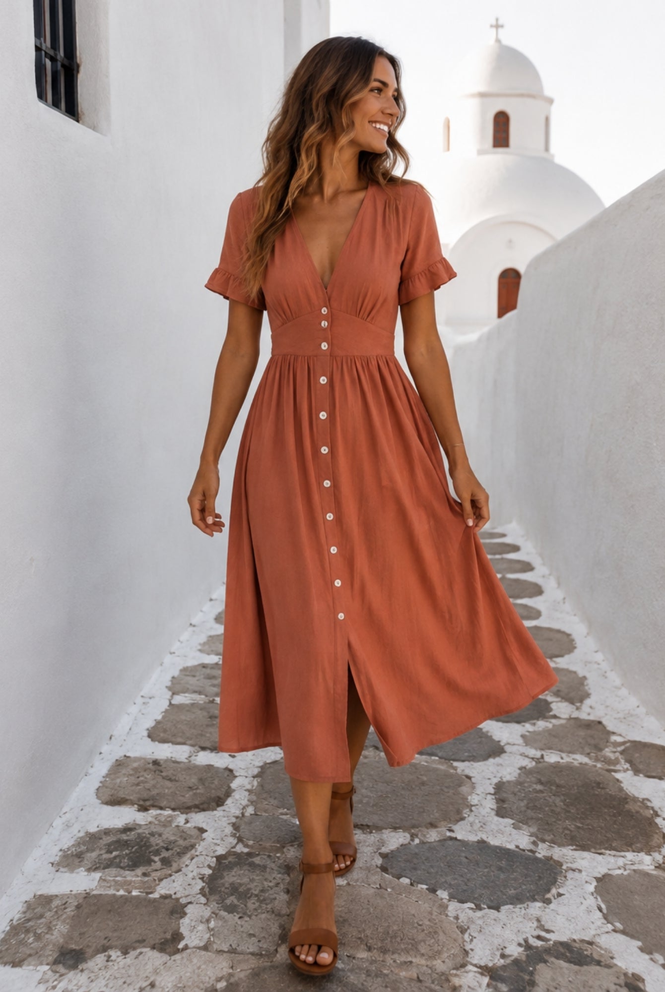 Women's rust linen midi dress with V neckline and button-up front, the Korbela Dress in Rust by Esther & Co