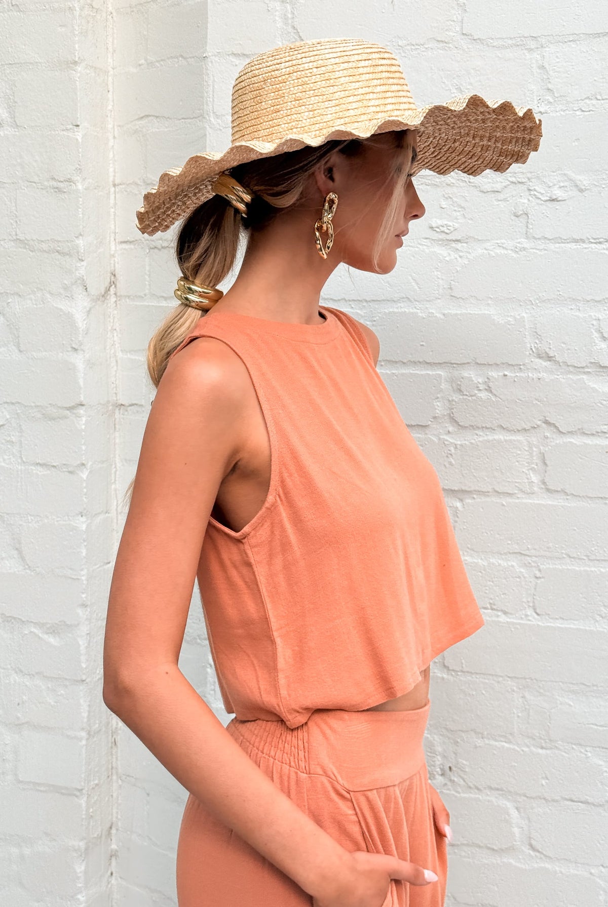 Women's cropped rust linen top styled for summer by Esther & Co