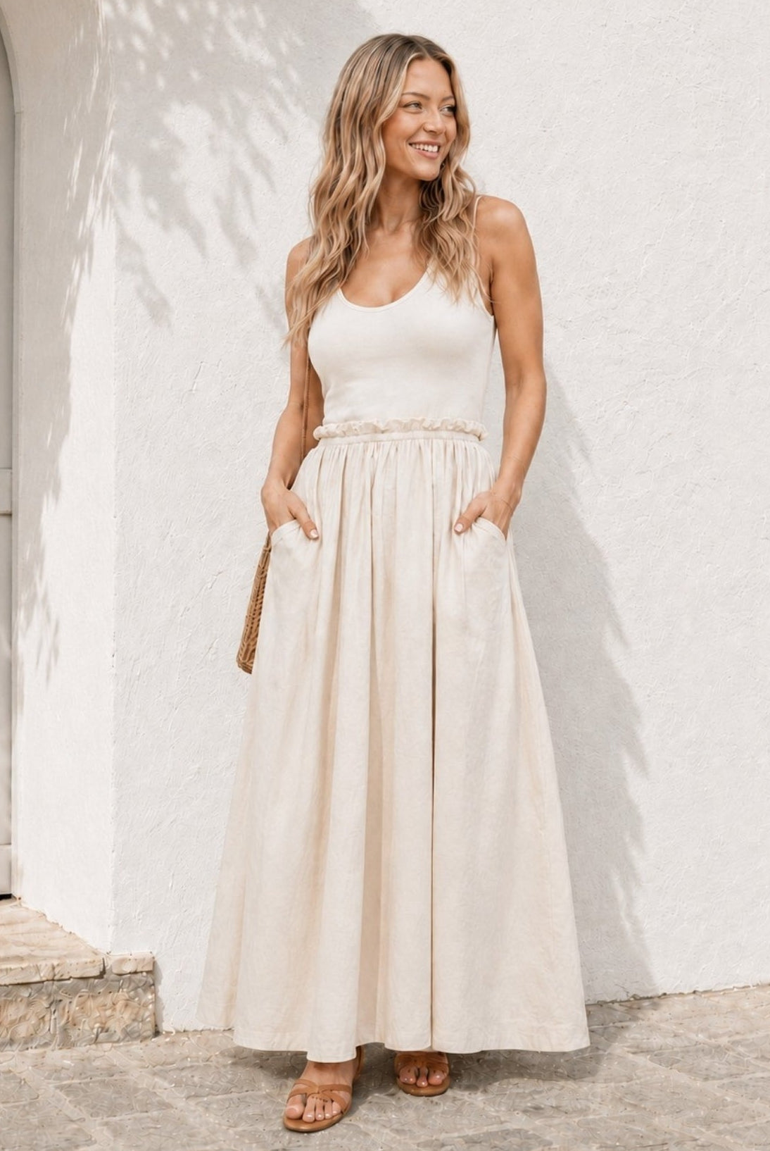 Women's ivory cotton maxi dress with ribbed bodice and frill waist, the Lucienne Dress in Ivory by Esther & Co