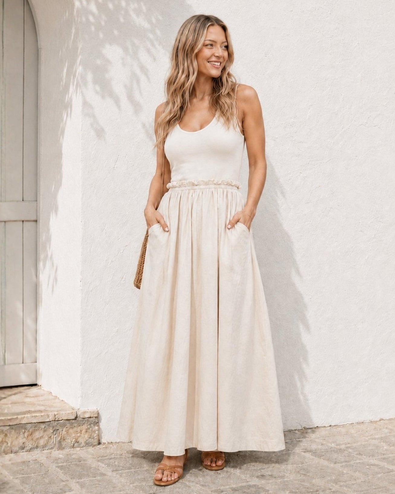 Women's ivory cotton maxi dress with ribbed bodice and frill waist, the Lucienne Dress in Ivory by Esther & Co