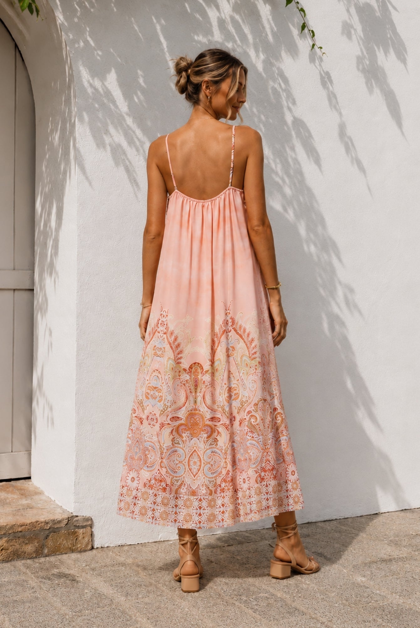 Women's blush lace maxi dress side view by Esther & Co