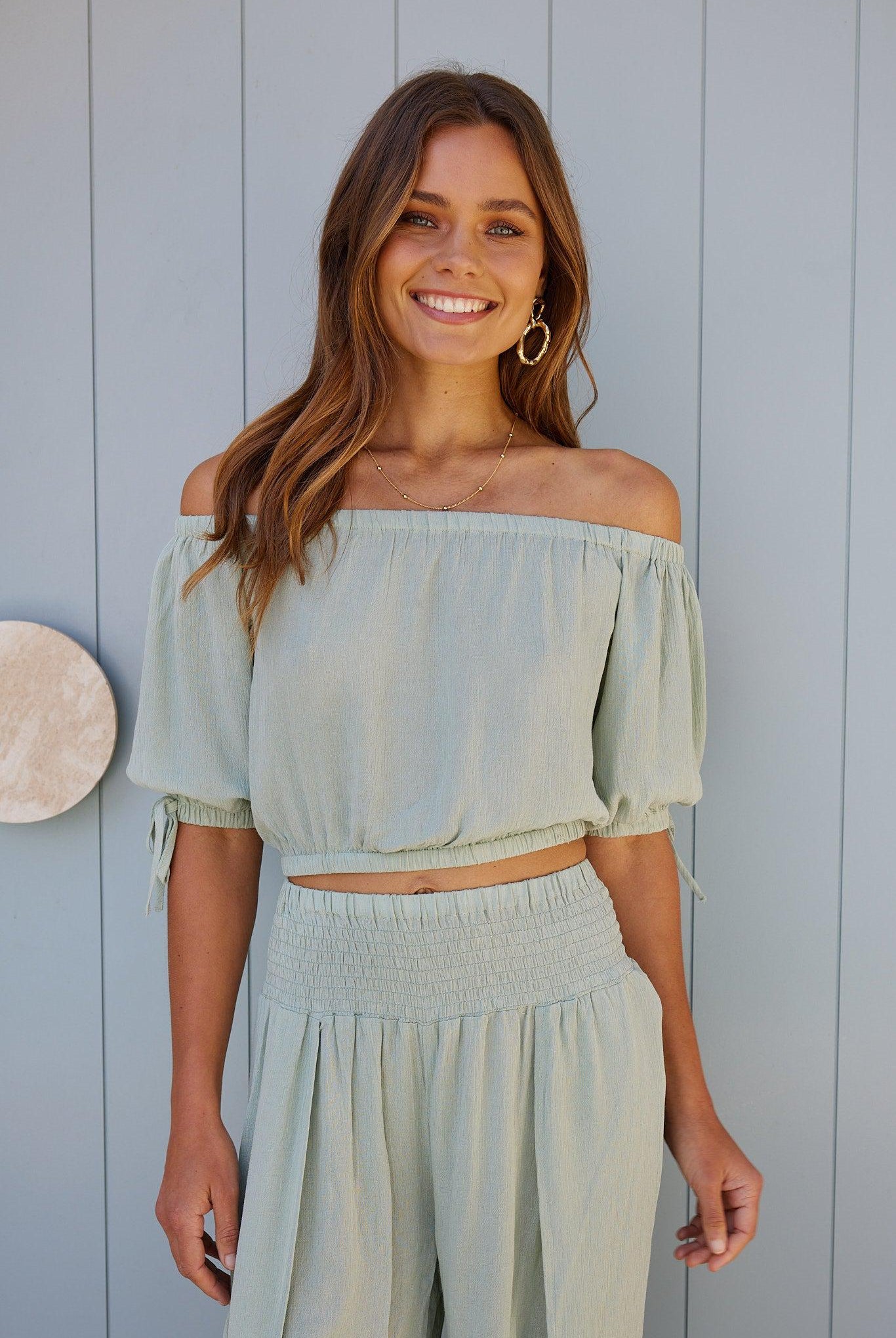 Women's sage green off-shoulder crop top, the Marinda Top in Sage by Esther & Co