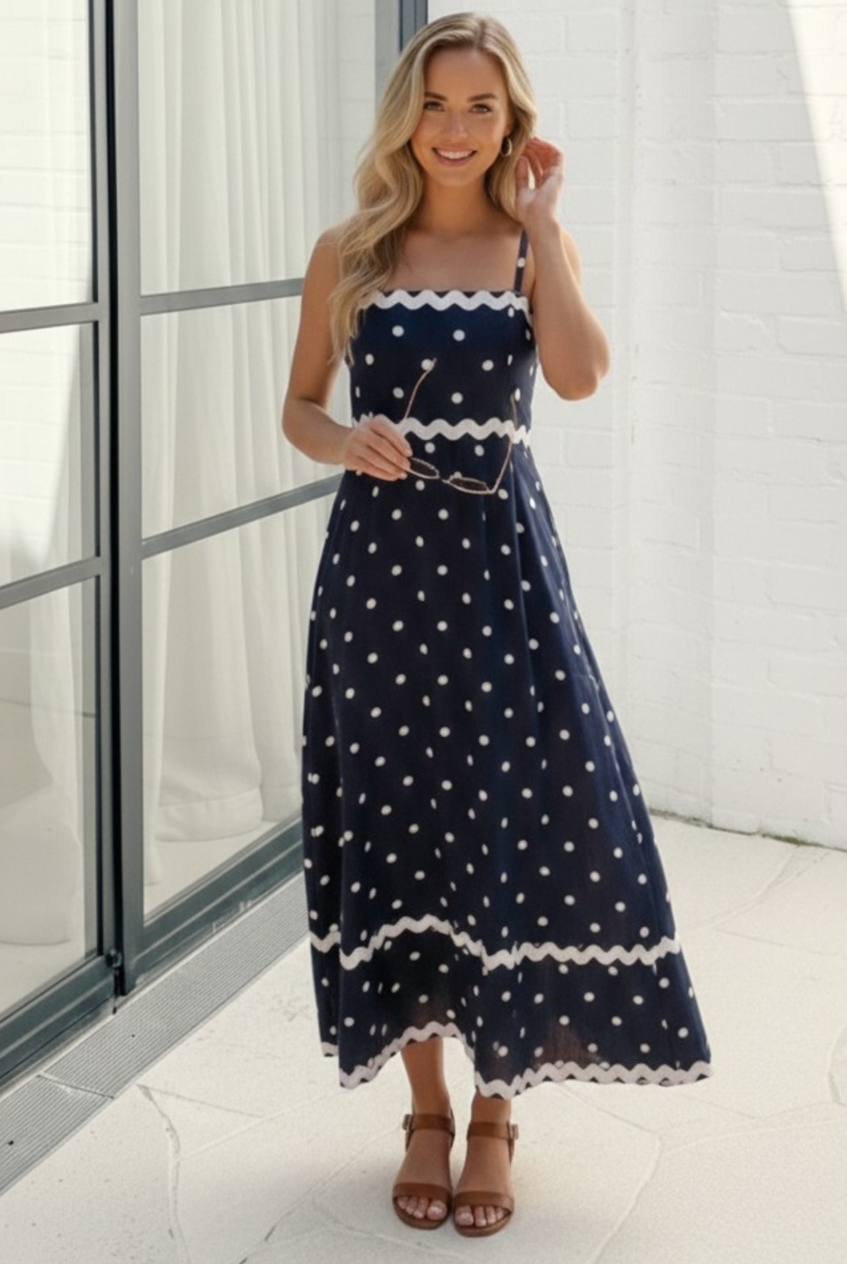 Women's navy spot midi dress styled outfit by Esther & Co