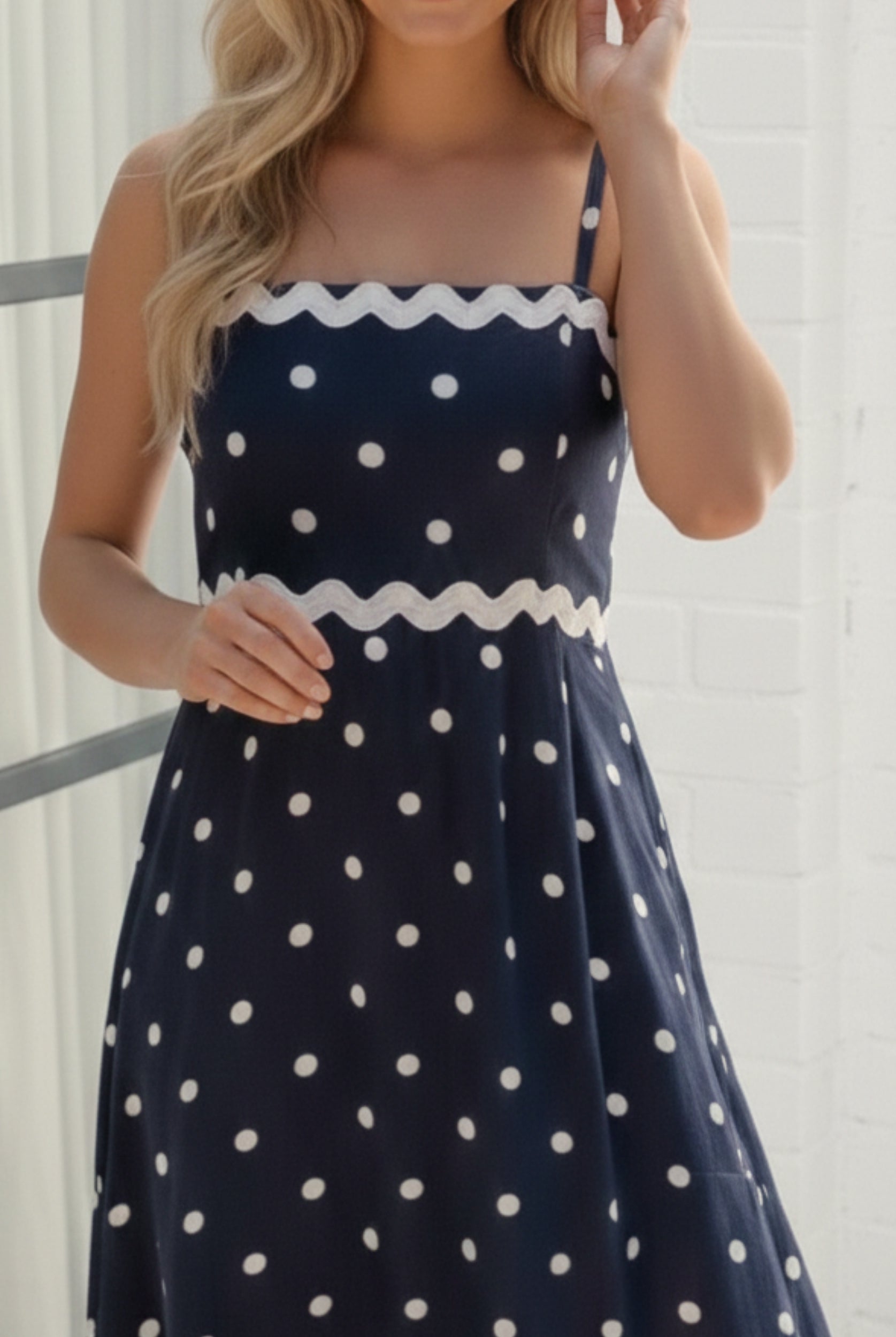 Women's navy spot midi dress front view by Esther & Co