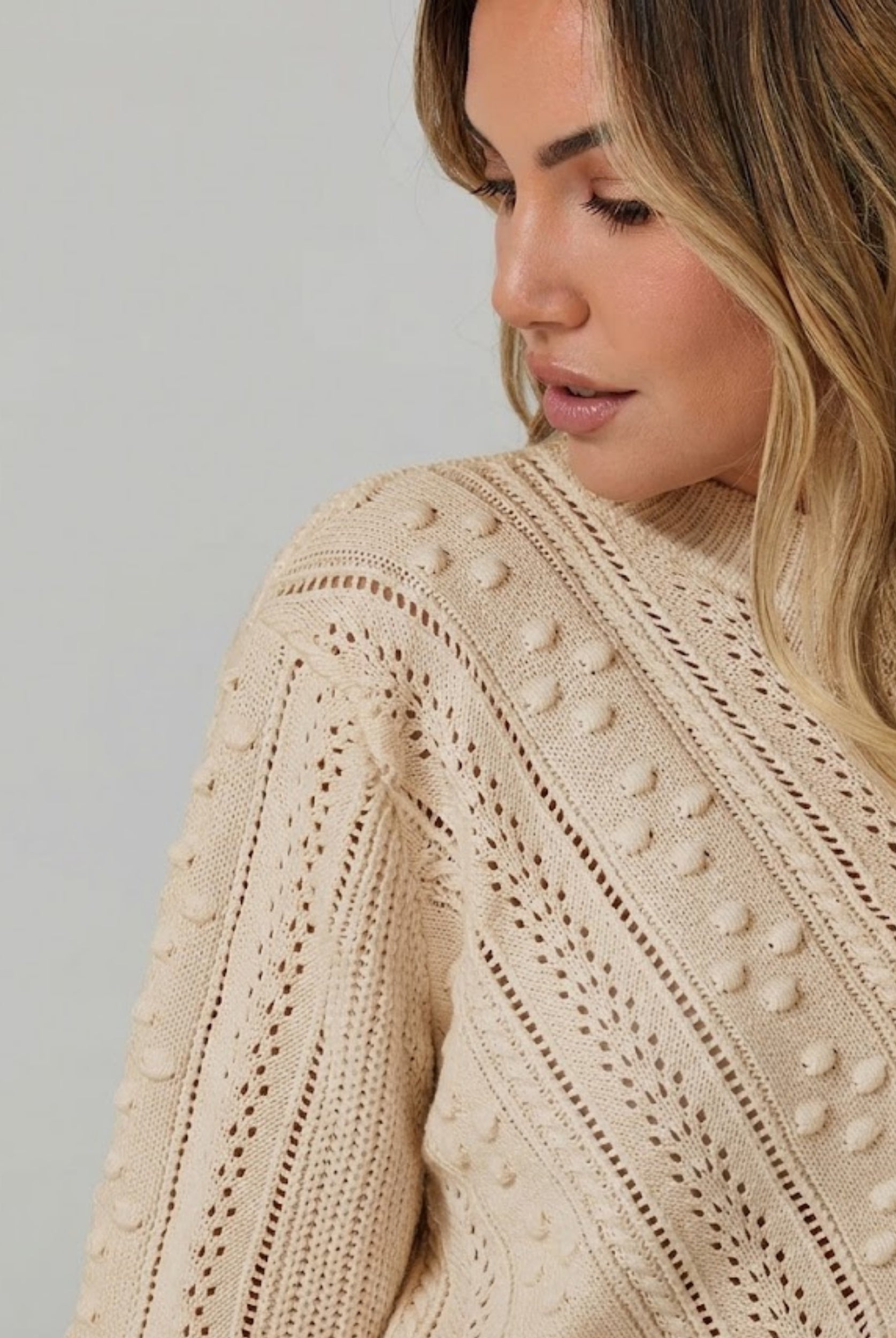 Rheane Knit in Latte latte pointelle stitch knit with chevron motif side view